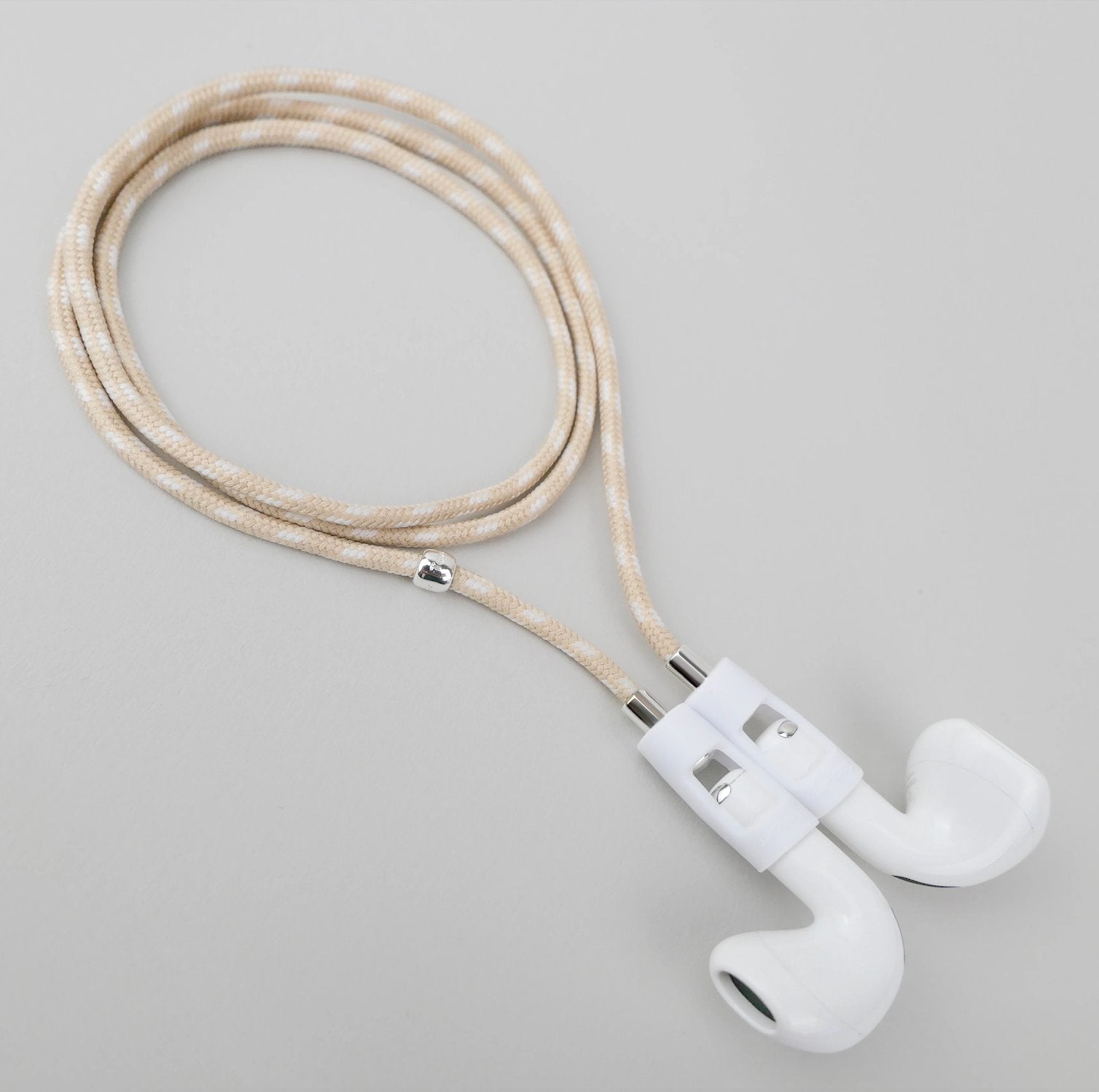 Tapper active's nylon straps for AirPods (compatible with all generations) & AirPods Pro with magnetic lock snaps the AirPods around your neck like a necklace. Magnetic anti-lost straps for AirPods. Designed in Sweden. Developed for working out & running.