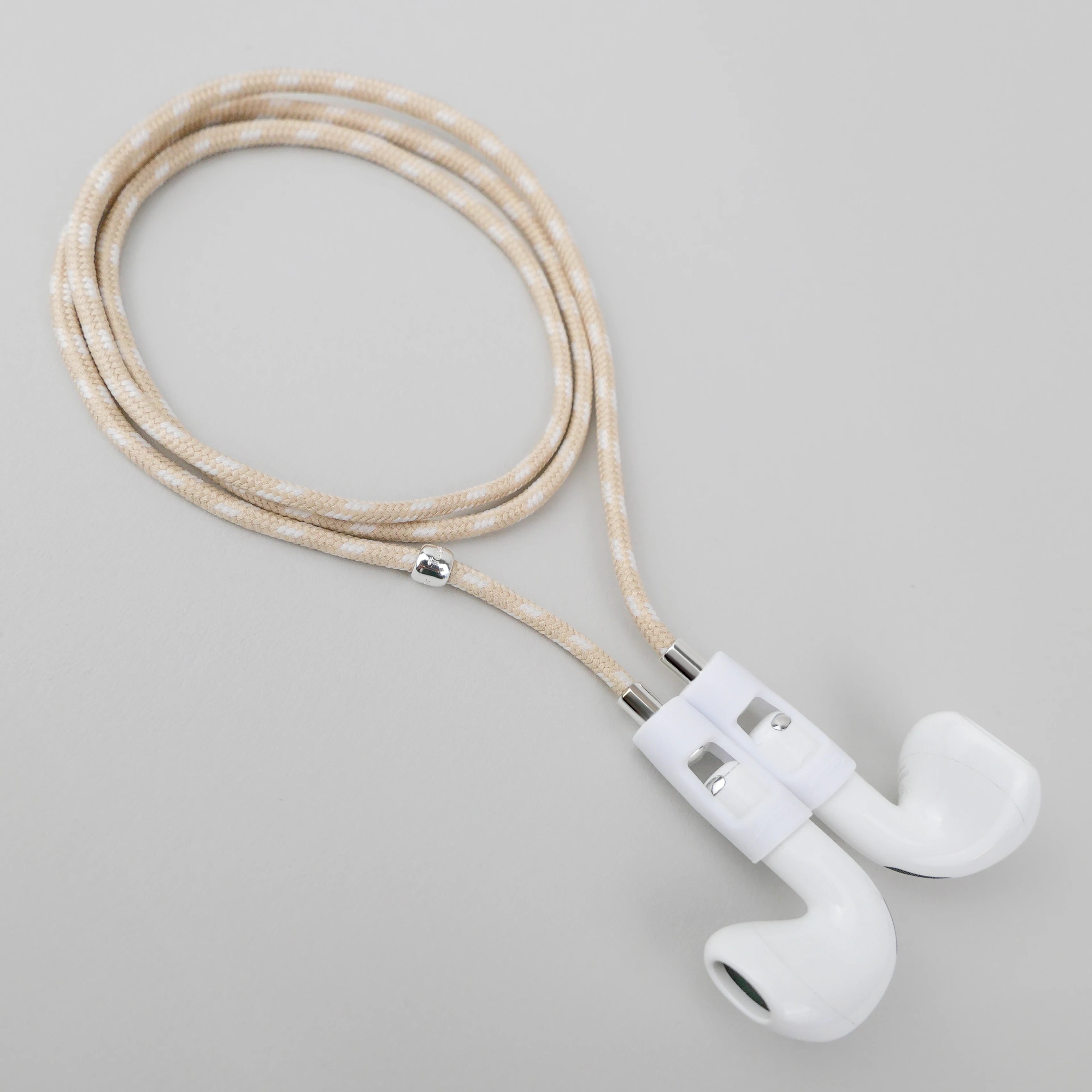 Never lose or misplace your AirPods again. Let the lightweight and durable Tapper Nylon AirPods Strap Necklace keep track of your AirPods and AirPods Pro by eliminating the need to hold them in your hands, drop them into your pockets, or risk losing them if they fall out of your ears. Comes with a built-in magnetic lock that snaps the AirPods around your neck, forming a sleek necklace and making them easily accessible. AirPods Strap compatible with Apple AirPods & AirPod Pro (1st, 2nd, 3rd, 4th generation)
