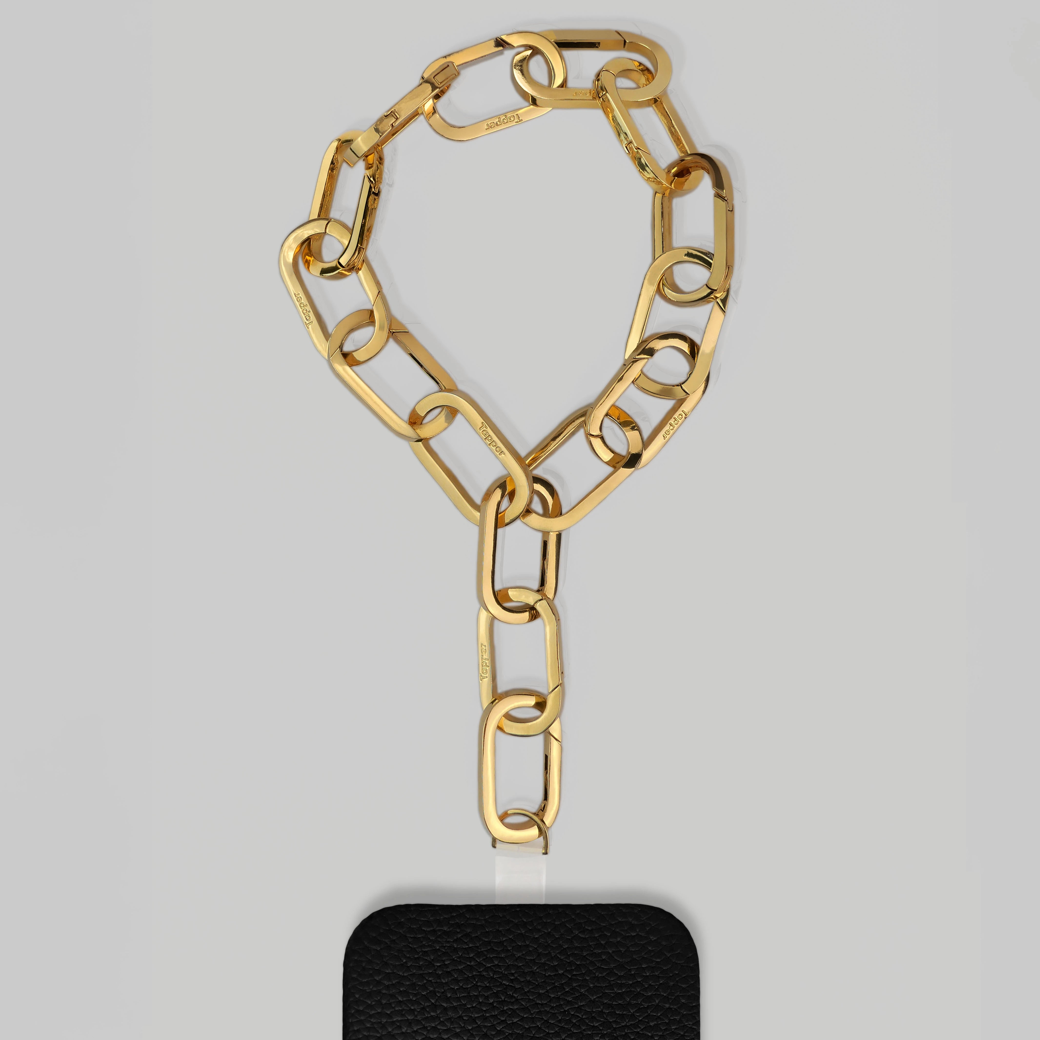 Tapper's Adjustable Phone Carabiner Wristlet Strap is an elevated metal phone wrist chain plated in 18k gold, designed to complement your phone case and your jewellery. Combine style with function by securing your phone to your wrist, belt loop or bag, protecting it from drops and falls as well as keeping it safe from pickpocketing. When not in use as a phone chain, adjust the carabiner links and use it as a bracelet or necklace instead. Compatible with all phone cases (iPhone, Samsung, Xiaomi, Oppo,Vivo