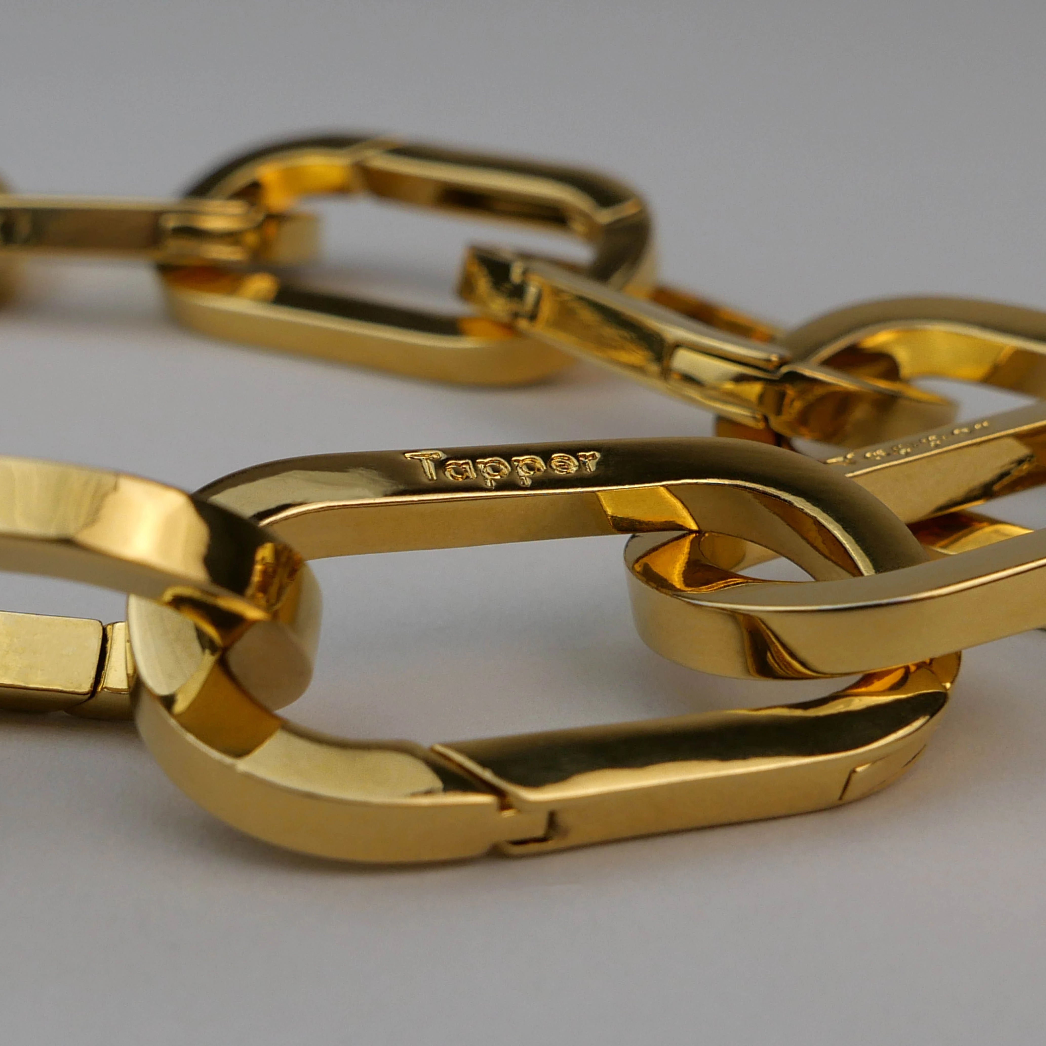 Tapper's Adjustable Phone Carabiner Wristlet Strap is an elevated metal phone wrist chain plated in 18k gold, designed to complement your phone case and your jewellery. Combine style with function by securing your phone to your wrist, belt loop or bag, protecting it from drops and falls as well as keeping it safe from pickpocketing. When not in use as a phone chain, adjust the carabiner links and use it as a bracelet or necklace instead. Compatible with all phone cases (iPhone, Samsung, Xiaomi, Oppo,Vivo
