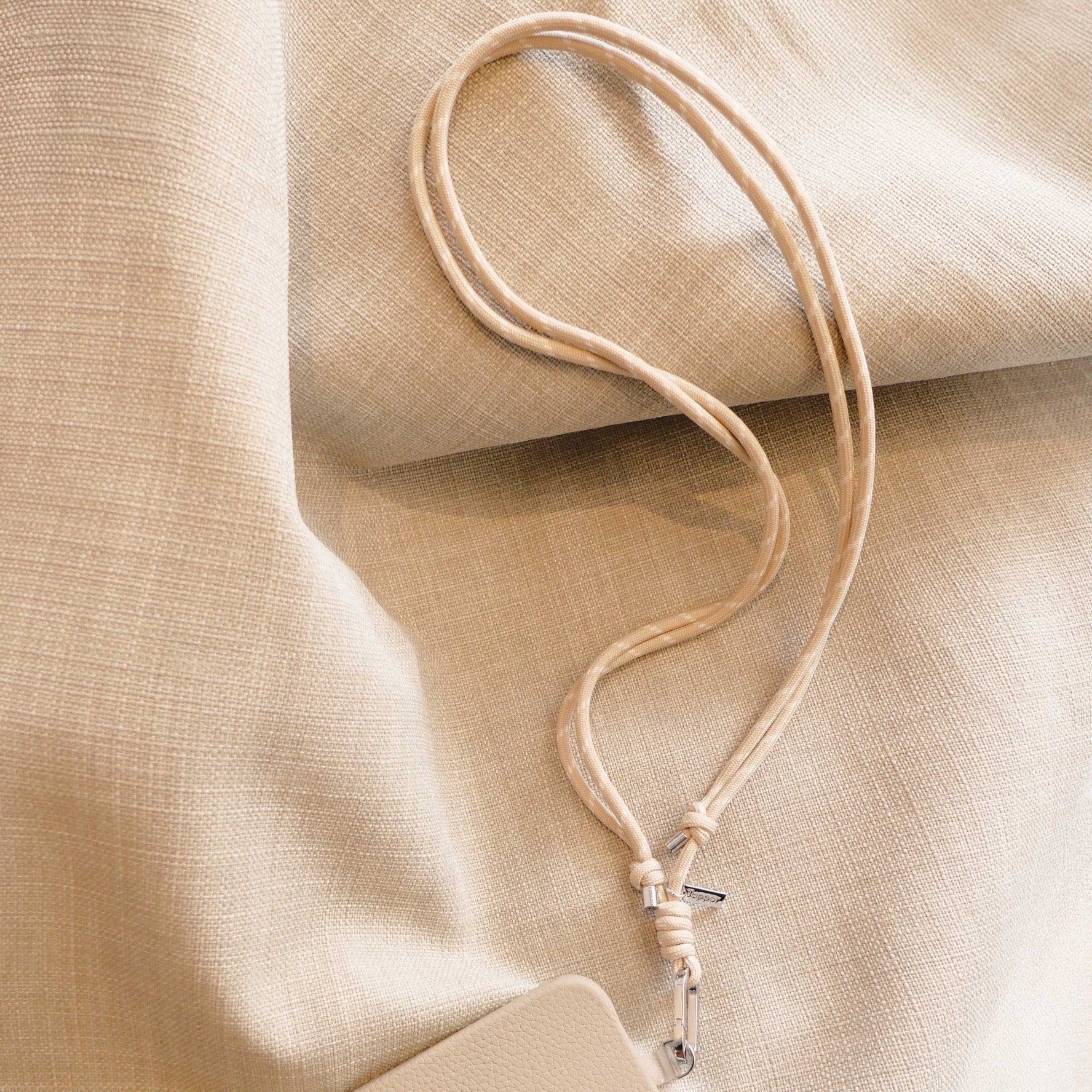 Tapper Adjustable Nylon Crossbody & Neck Phone Strap with silver details—luxury, secure & stylish phone accessory for all phone cases.