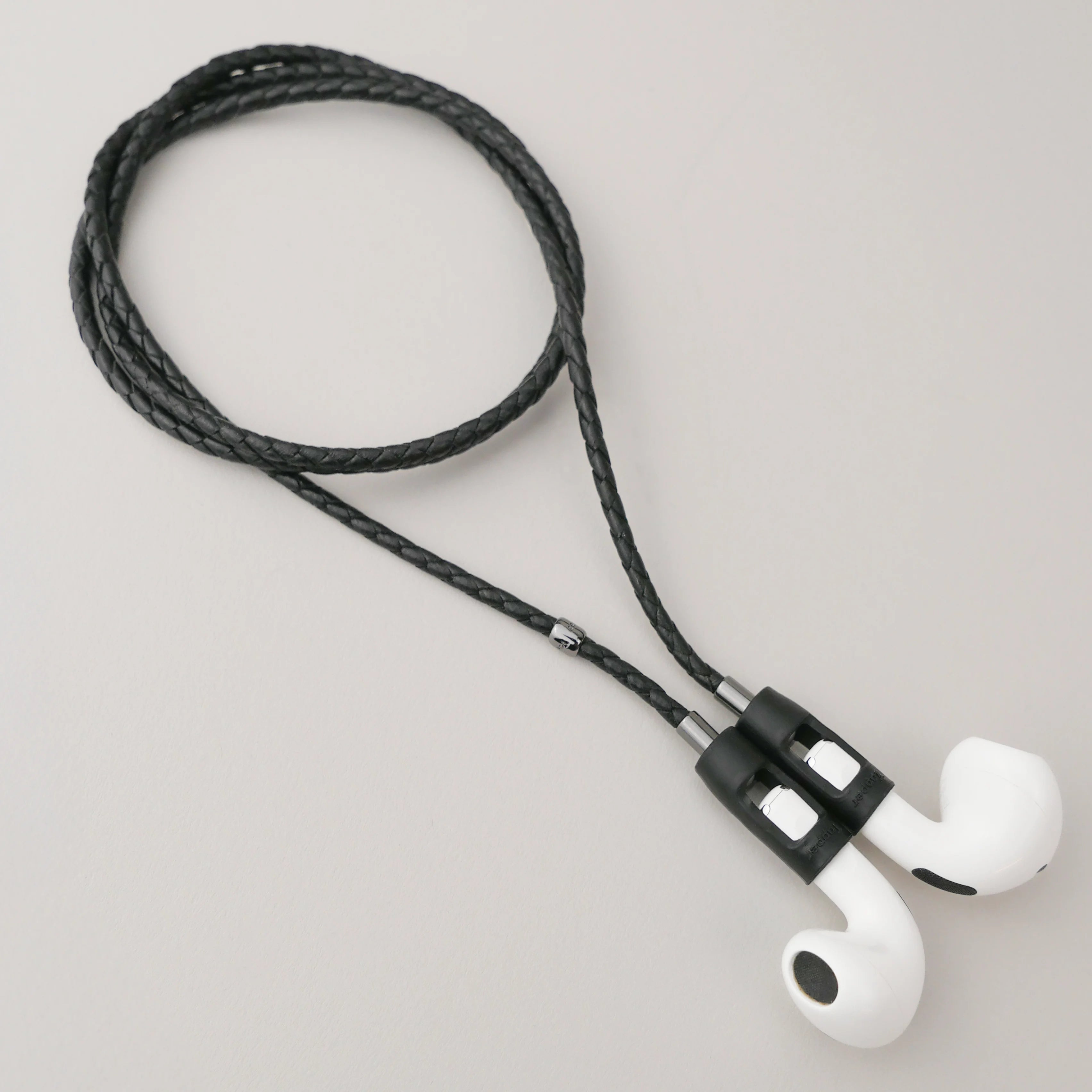 Tapper Lamb Leather AirPods Carrying Strap for All AirPods & AirPods Pro with magnetic lock, secure fit & luxurious hands-free design.