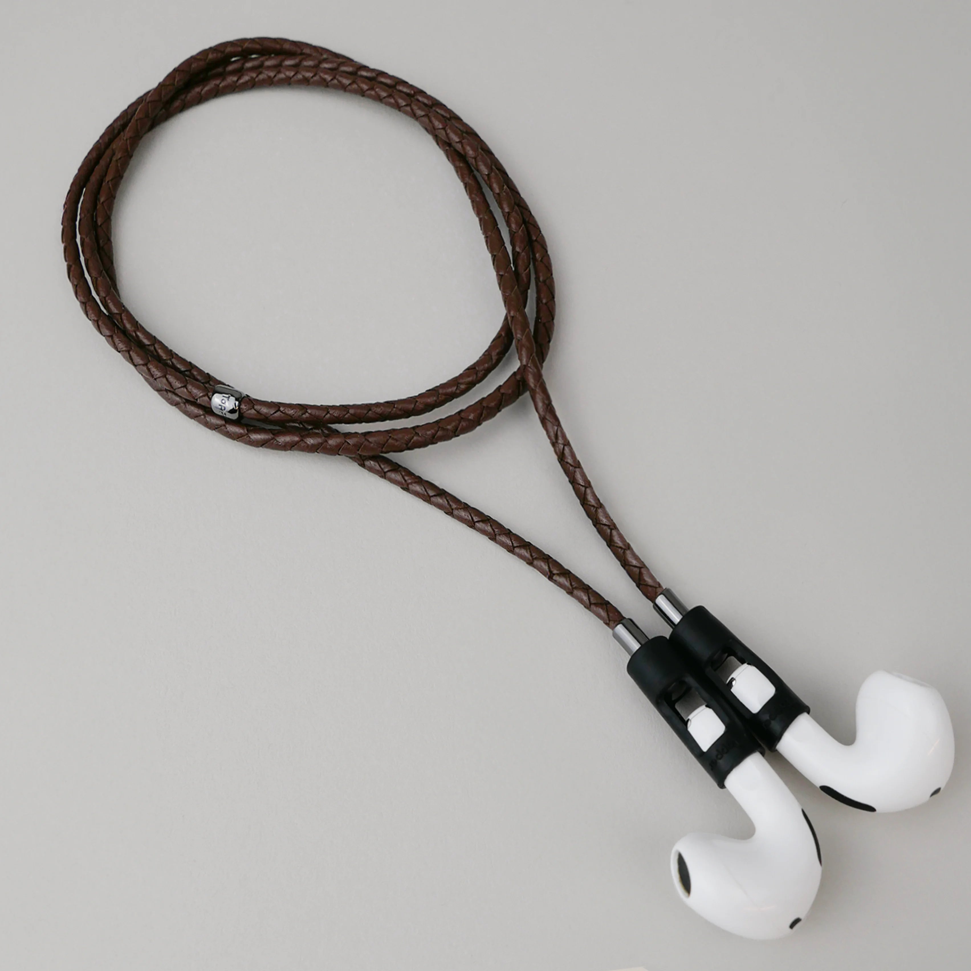 Tapper Lamb Leather AirPods Carrying Strap for All AirPods & AirPods Pro with magnetic lock, secure fit & luxurious hands-free design.
