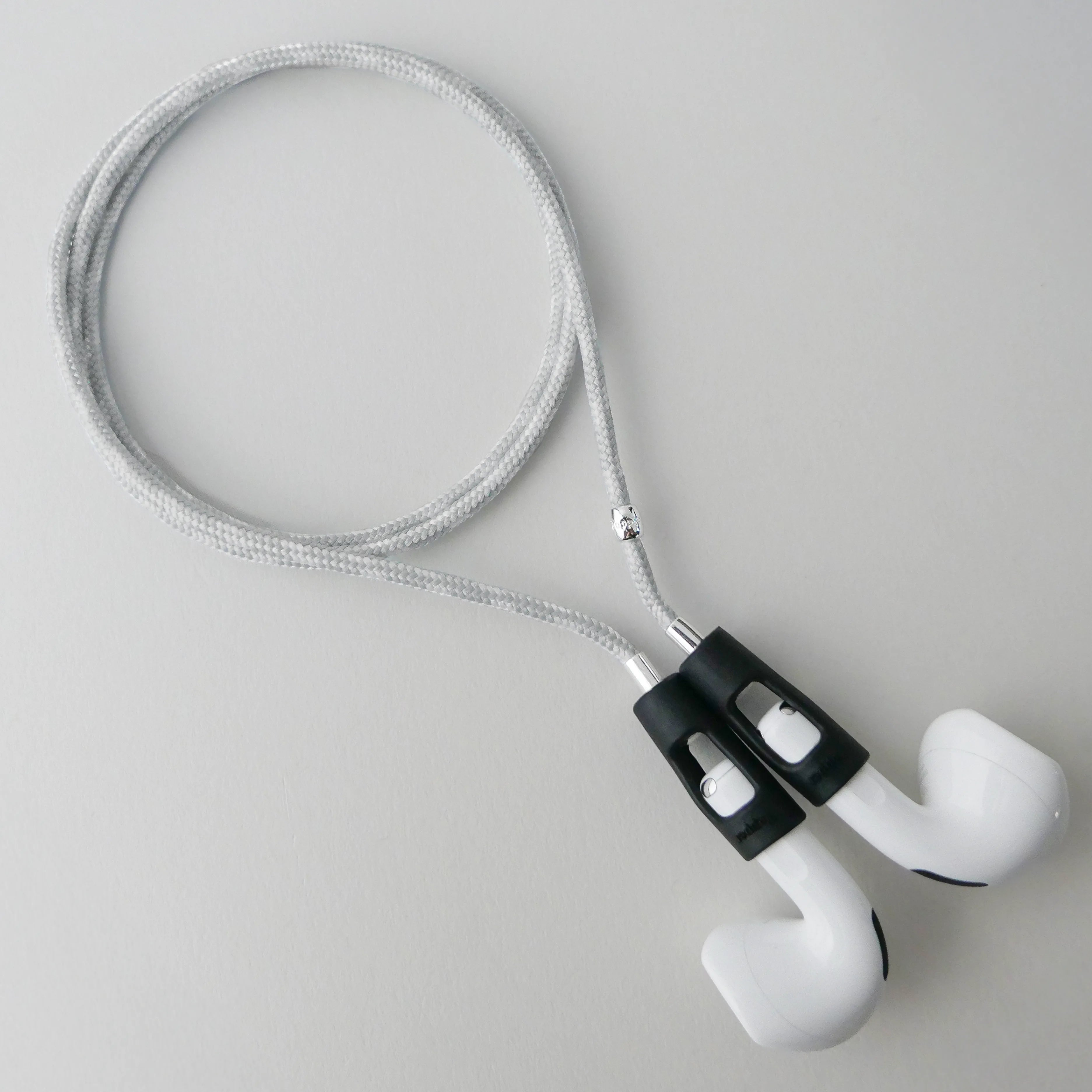 Never lose or misplace your AirPods again. Let the lightweight and durable Tapper Nylon AirPods Strap Necklace keep track of your AirPods and AirPods Pro by eliminating the need to hold them in your hands, drop them into your pockets, or risk losing them if they fall out of your ears. Comes with a built-in magnetic lock that snaps the AirPods around your neck, forming a sleek necklace and making them easily accessible. AirPods Strap compatible with Apple AirPods & AirPod Pro (1st, 2nd, 3rd, 4th generation)