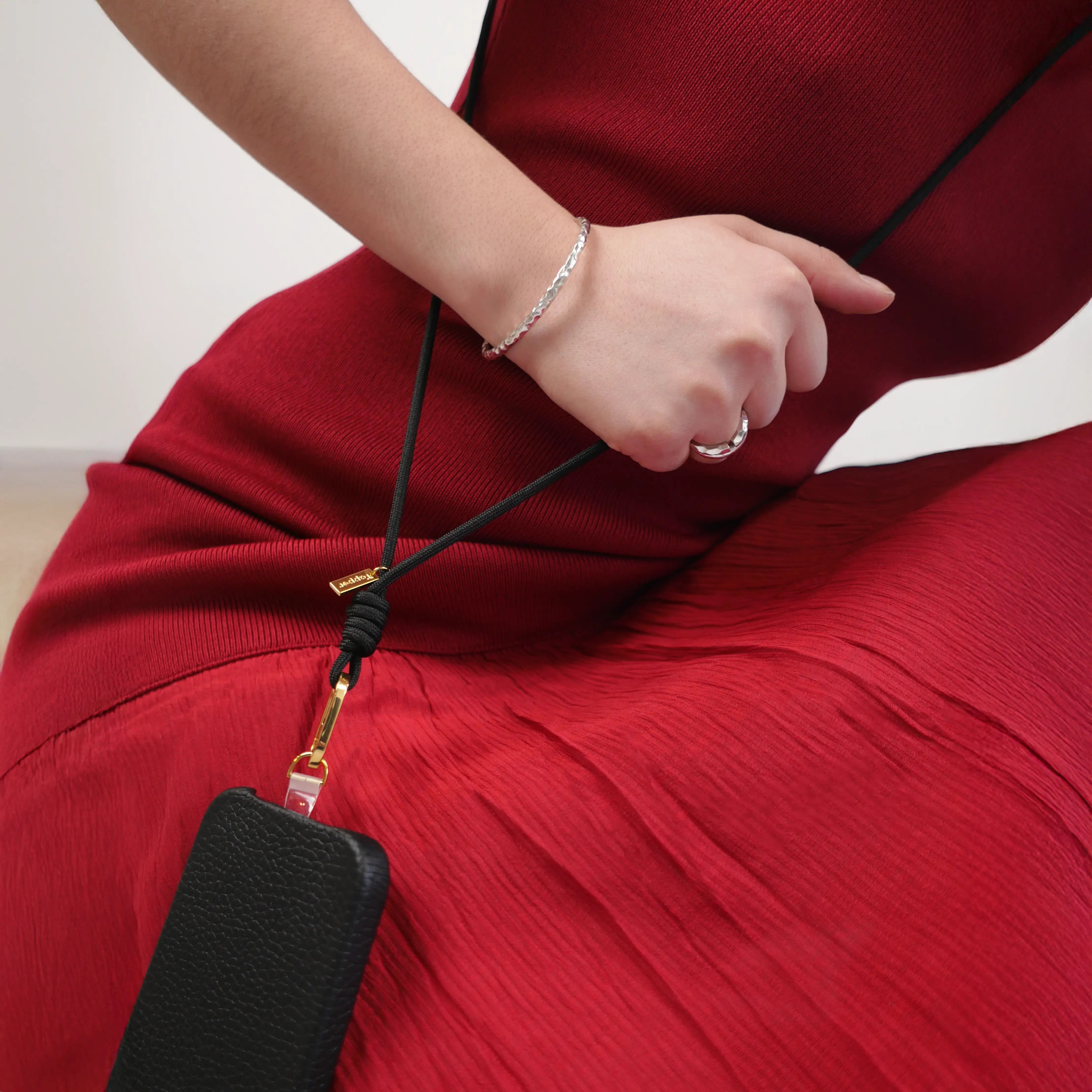Tapper Adjustable Nylon Crossbody & Neck Phone Strap with 18k gold details—luxury, secure & stylish phone accessory for all phone cases.
