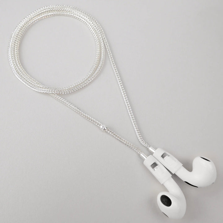 Tapper's real 925 silver plated original tech jewelry mesh chain protects your AirPods. The luxurious, elevated and accessible necklace plated in precious metals steps up your AirPod jewellery game. Worried about losing your AirPods? Magnetic lock for convenient and hassle-free safekeeping around the neck. The next must-have AirPods accessory crafted for ultimate luxury. Compatible with all generations of Apple AirPods and AirPods Pro. Designed in Sweden by Tapper. Free Express Shipping at gettapper.com