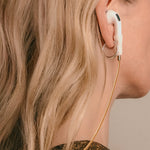Tapper's real 18K gold plated original tech jewelry mesh chain protects your AirPods. The luxurious, elevated and accessible necklace plated in precious metals steps up your AirPod jewellery game. Worried about losing your AirPods? Magnetic lock for convenient and hassle-free safekeeping around the neck. The next must-have AirPods accessory crafted for ultimate luxury. Compatible with all generations of Apple AirPods and AirPods Pro. Designed in Sweden by Tapper. Free Express Shipping at gettapper.com