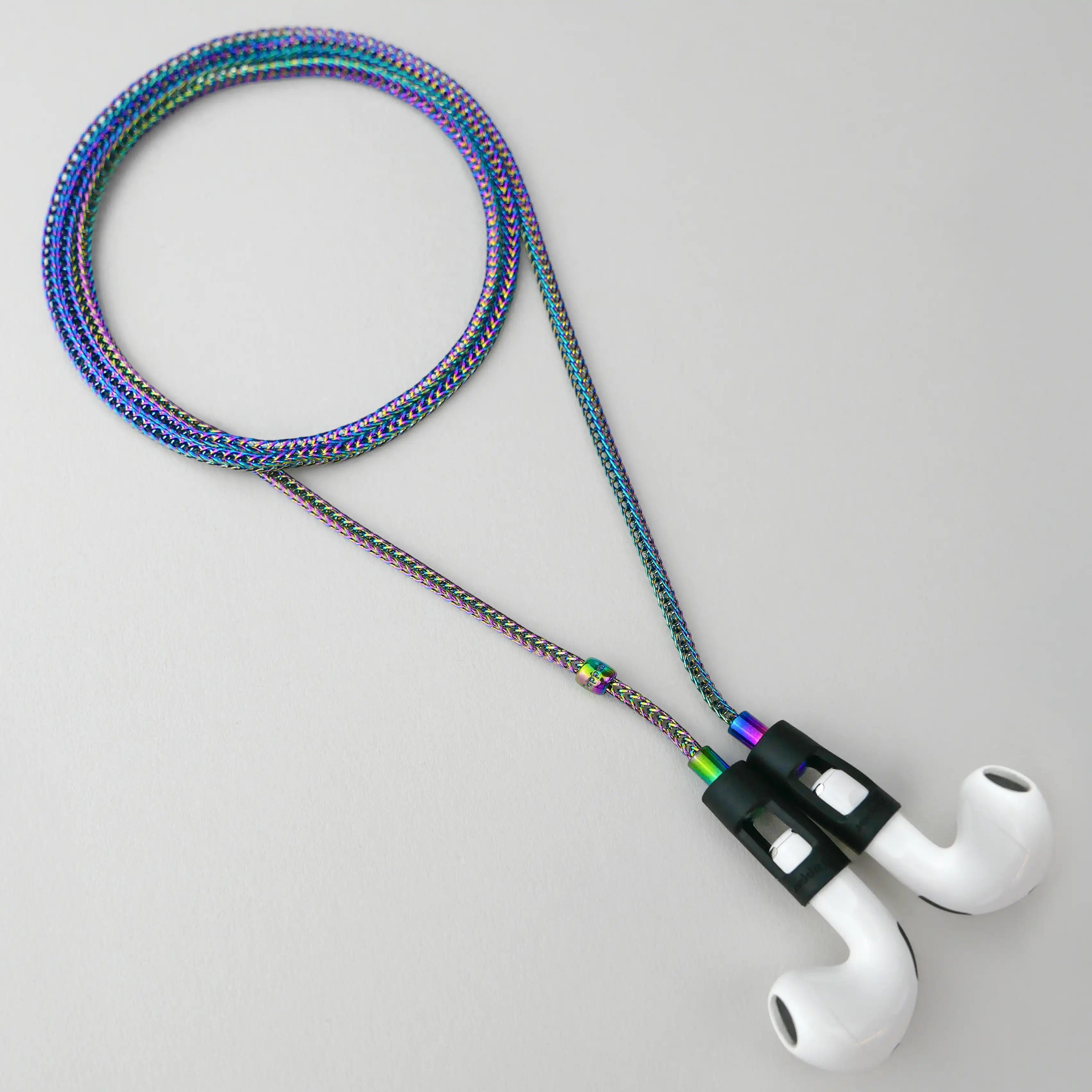Tapper's real oil plated original tech jewelry mesh chain protects your AirPods. The luxurious, elevated and accessible necklace plated in precious metals steps up your AirPod jewellery game. Worried about losing your AirPods? Magnetic lock for convenient and hassle-free safekeeping around the neck. The next must-have AirPods accessory crafted for ultimate luxury. Compatible with all generations of Apple AirPods and AirPods Pro. Designed in Sweden by Tapper. Free Express Shipping at gettapper.com
