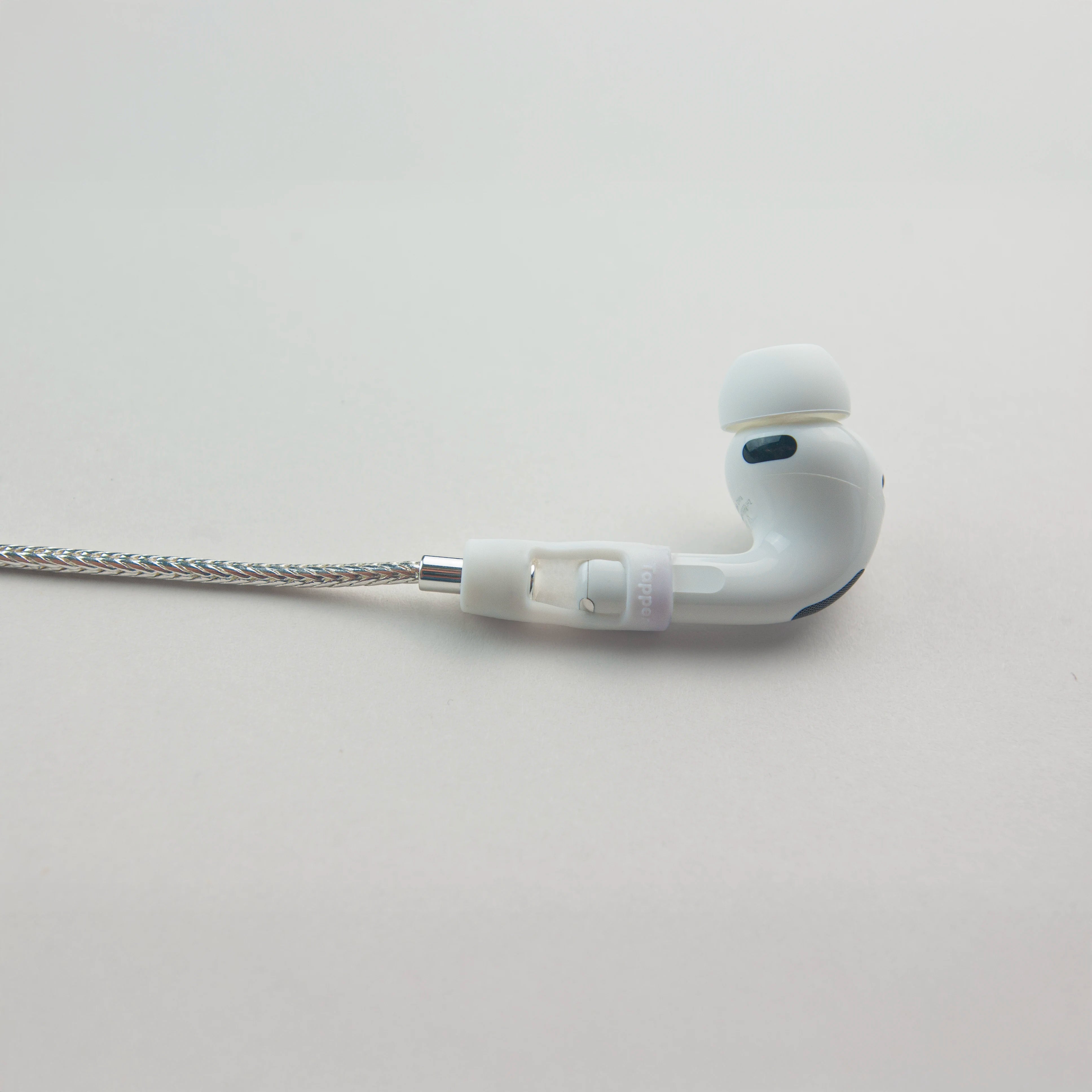 Tapper's real 925 silver plated original tech jewelry foxtail chain protects your AirPods. The luxurious, elevated and accessible necklace plated in precious metals steps up your AirPod jewellery game. Worried about losing your AirPods? Magnetic lock for convenient and hassle-free safekeeping around the neck. The next must-have AirPods accessory crafted for ultimate luxury. Compatible with all generations of Apple AirPods and AirPods Pro. Designed in Sweden by Tapper. Free Express Shipping at gettapper.com