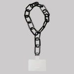 Tapper's Adjustable Phone Carabiner Wristlet Strap is an elevated metal phone wrist chain plated in black, designed to complement your phone case and your jewellery. Combine style with function by securing your phone to your wrist, belt loop or bag, protecting it from drops and falls as well as keeping it safe from pickpocketing. When not in use as a phone chain, adjust the carabiner links and use it as a bracelet or necklace instead. Compatible with all phone cases (iPhone, Samsung, Xiaomi, Oppo,Vivo