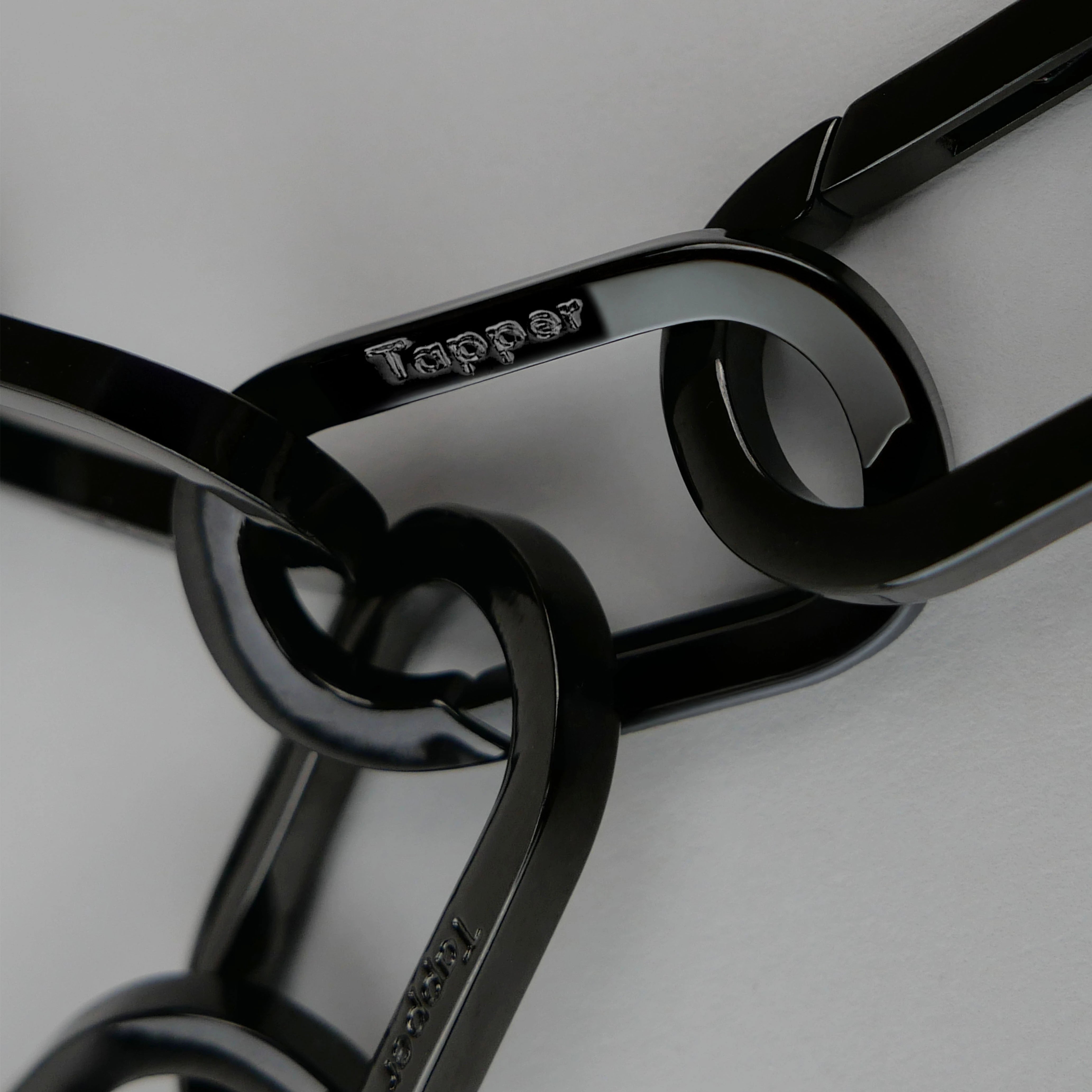 Tapper's Adjustable Phone Carabiner Wristlet Strap is an elevated metal phone wrist chain plated in black, designed to complement your phone case and your jewellery. Combine style with function by securing your phone to your wrist, belt loop or bag, protecting it from drops and falls as well as keeping it safe from pickpocketing. When not in use as a phone chain, adjust the carabiner links and use it as a bracelet or necklace instead. Compatible with all phone cases (iPhone, Samsung, Xiaomi, Oppo,Vivo