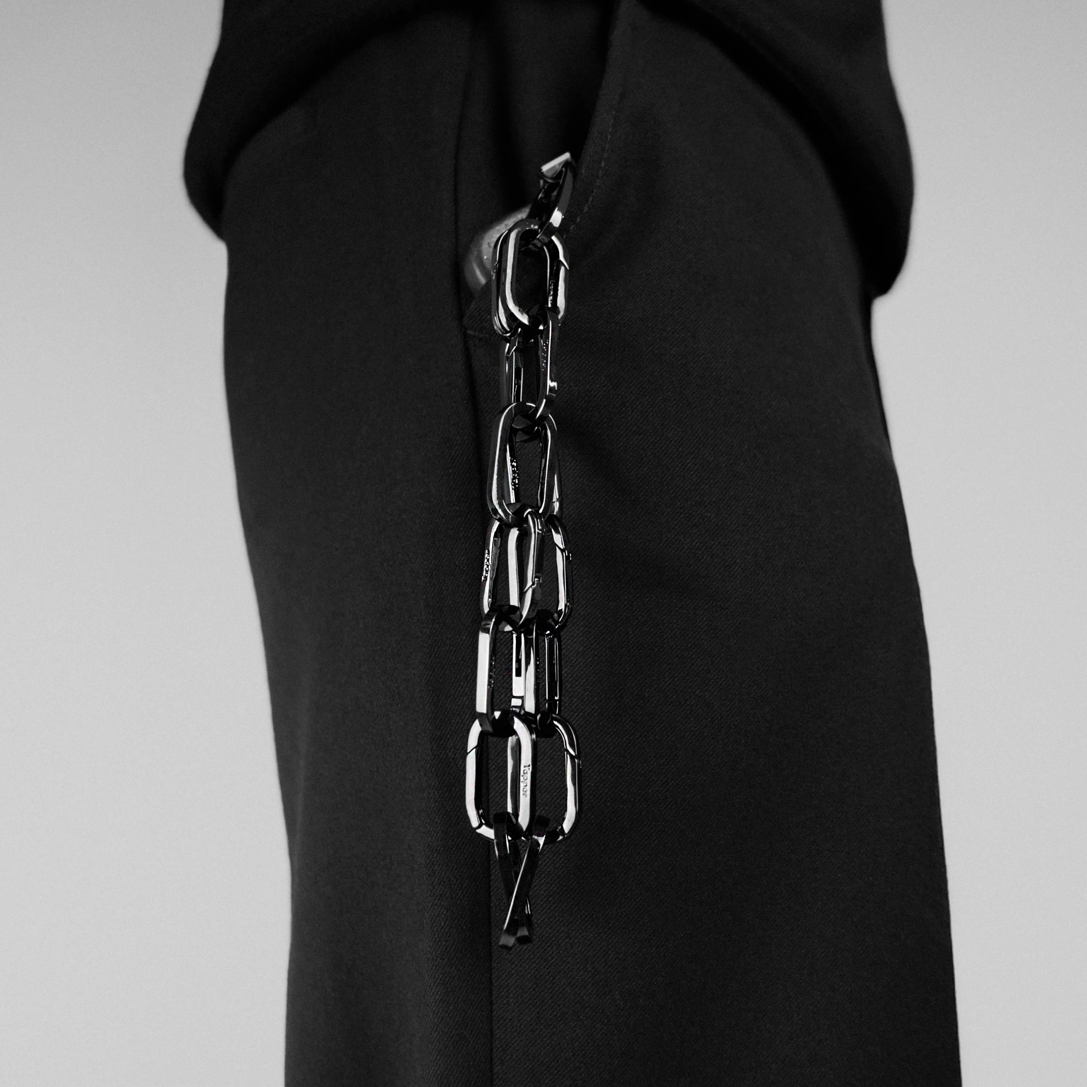 Tapper's Adjustable Phone Carabiner Wristlet Strap is an elevated metal phone wrist chain plated in black, designed to complement your phone case and your jewellery. Combine style with function by securing your phone to your wrist, belt loop or bag, protecting it from drops and falls as well as keeping it safe from pickpocketing. When not in use as a phone chain, adjust the carabiner links and use it as a bracelet or necklace instead. Compatible with all phone cases (iPhone, Samsung, Xiaomi, Oppo,Vivo