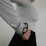 Tapper's Adjustable Phone Carabiner Wristlet Strap is an elevated metal phone wrist chain plated in black, designed to complement your phone case and your jewellery. Combine style with function by securing your phone to your wrist, belt loop or bag, protecting it from drops and falls as well as keeping it safe from pickpocketing. When not in use as a phone chain, adjust the carabiner links and use it as a bracelet or necklace instead. Compatible with all phone cases (iPhone, Samsung, Xiaomi, Oppo,Vivo