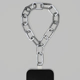 Tapper's Adjustable Phone Carabiner Wristlet Strap is an elevated metal phone wrist chain colored in Silver, designed to complement your phone case and your jewellery. Combine style with function by securing your phone to your wrist, belt loop or bag, protecting it from drops and falls as well as keeping it safe from pickpocketing. When not in use as a phone chain, adjust the carabiner links and use it as a bracelet or necklace instead. Compatible with all phone cases (iPhone, Samsung, Xiaomi, Oppo,Vivo