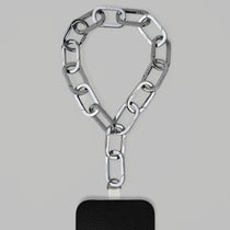 Tapper's Adjustable Phone Carabiner Wristlet Strap is an elevated metal phone wrist chain colored in Silver, designed to complement your phone case and your jewellery. Combine style with function by securing your phone to your wrist, belt loop or bag, protecting it from drops and falls as well as keeping it safe from pickpocketing. When not in use as a phone chain, adjust the carabiner links and use it as a bracelet or necklace instead. Compatible with all phone cases (iPhone, Samsung, Xiaomi, Oppo,Vivo