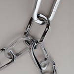 Tapper's Adjustable Phone Carabiner Wristlet Strap is an elevated metal phone wrist chain colored in Silver, designed to complement your phone case and your jewellery. Combine style with function by securing your phone to your wrist, belt loop or bag, protecting it from drops and falls as well as keeping it safe from pickpocketing. When not in use as a phone chain, adjust the carabiner links and use it as a bracelet or necklace instead. Compatible with all phone cases (iPhone, Samsung, Xiaomi, Oppo,Vivo