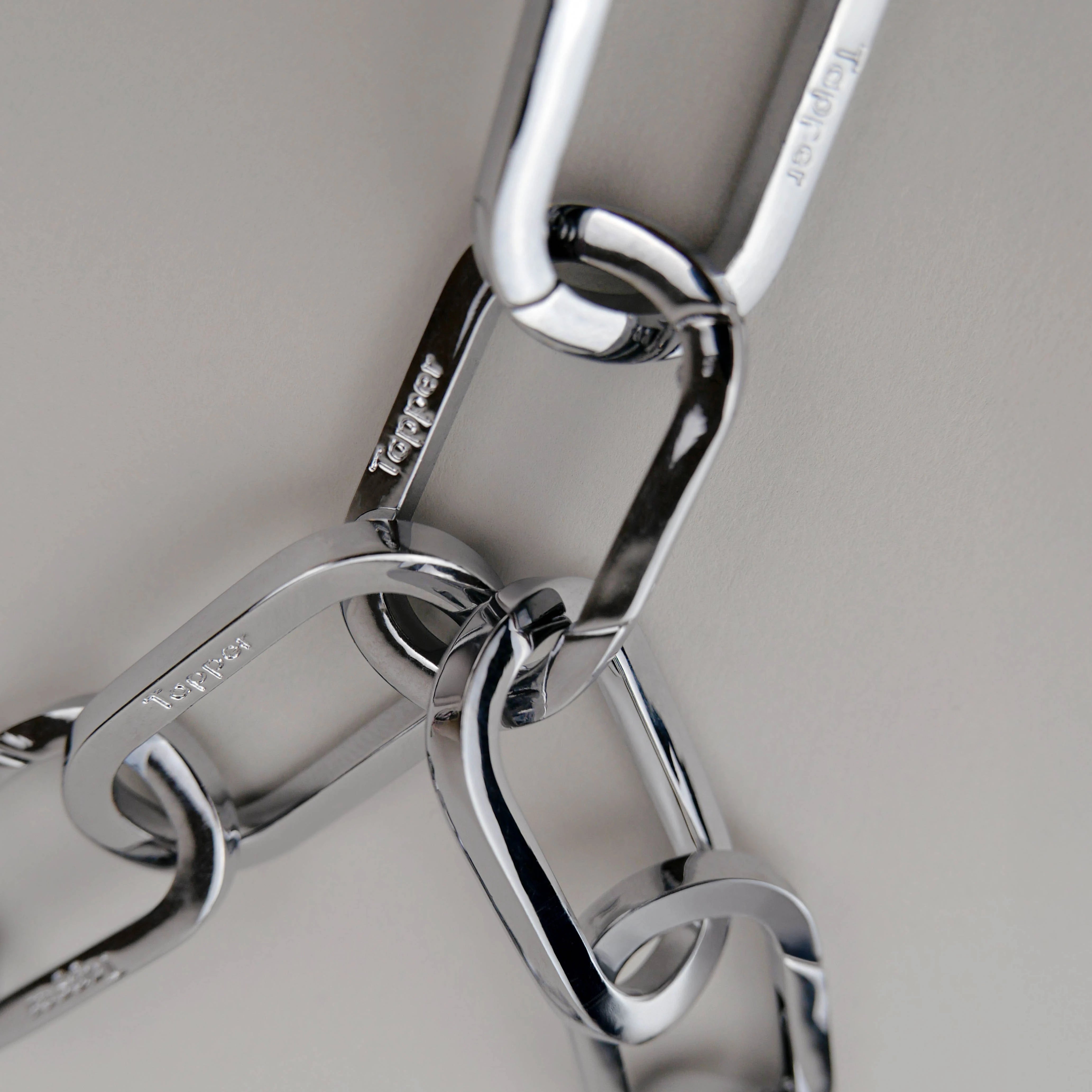 Tapper's Adjustable Phone Carabiner Wristlet Strap is an elevated metal phone wrist chain colored in Silver, designed to complement your phone case and your jewellery. Combine style with function by securing your phone to your wrist, belt loop or bag, protecting it from drops and falls as well as keeping it safe from pickpocketing. When not in use as a phone chain, adjust the carabiner links and use it as a bracelet or necklace instead. Compatible with all phone cases (iPhone, Samsung, Xiaomi, Oppo,Vivo