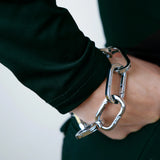 Tapper's Adjustable Phone Carabiner Wristlet Strap is an elevated metal phone wrist chain colored in Silver, designed to complement your phone case and your jewellery. Combine style with function by securing your phone to your wrist, belt loop or bag, protecting it from drops and falls as well as keeping it safe from pickpocketing. When not in use as a phone chain, adjust the carabiner links and use it as a bracelet or necklace instead. Compatible with all phone cases (iPhone, Samsung, Xiaomi, Oppo,Vivo