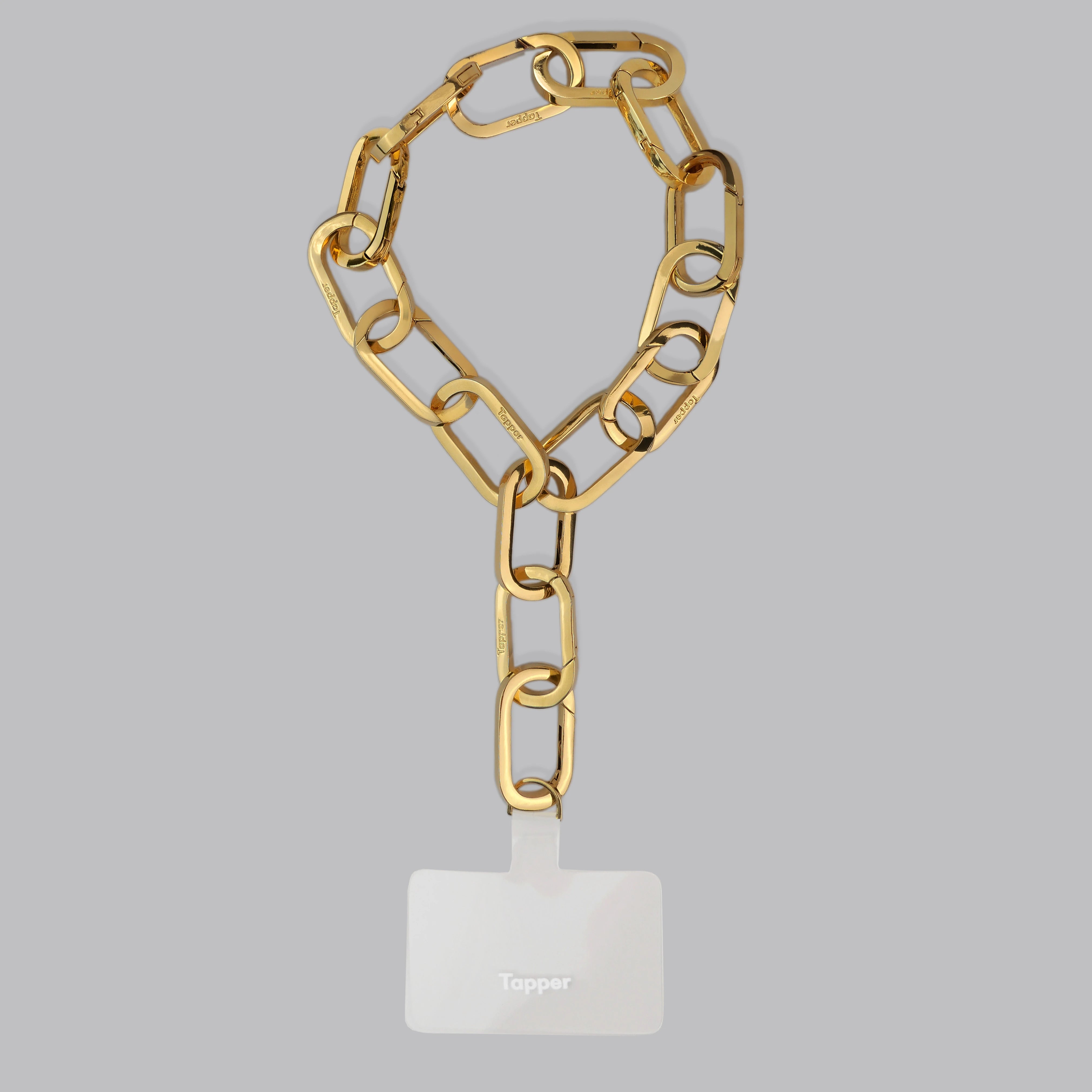 Tapper's Adjustable Phone Carabiner Wristlet Strap is an elevated metal phone wrist chain plated in 18k gold, designed to complement your phone case and your jewellery. Combine style with function by securing your phone to your wrist, belt loop or bag, protecting it from drops and falls as well as keeping it safe from pickpocketing. When not in use as a phone chain, adjust the carabiner links and use it as a bracelet or necklace instead. Compatible with all phone cases (iPhone, Samsung, Xiaomi, Oppo,Vivo