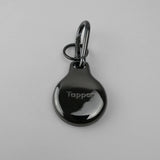 Black Metal Plated AirTag Holder & Case – Luxurious and Secure – A refined metal carabiner case designed to elegantly secure your AirTag to keys, bags, luggage, and more. Crafted by Tapper in Sweden.