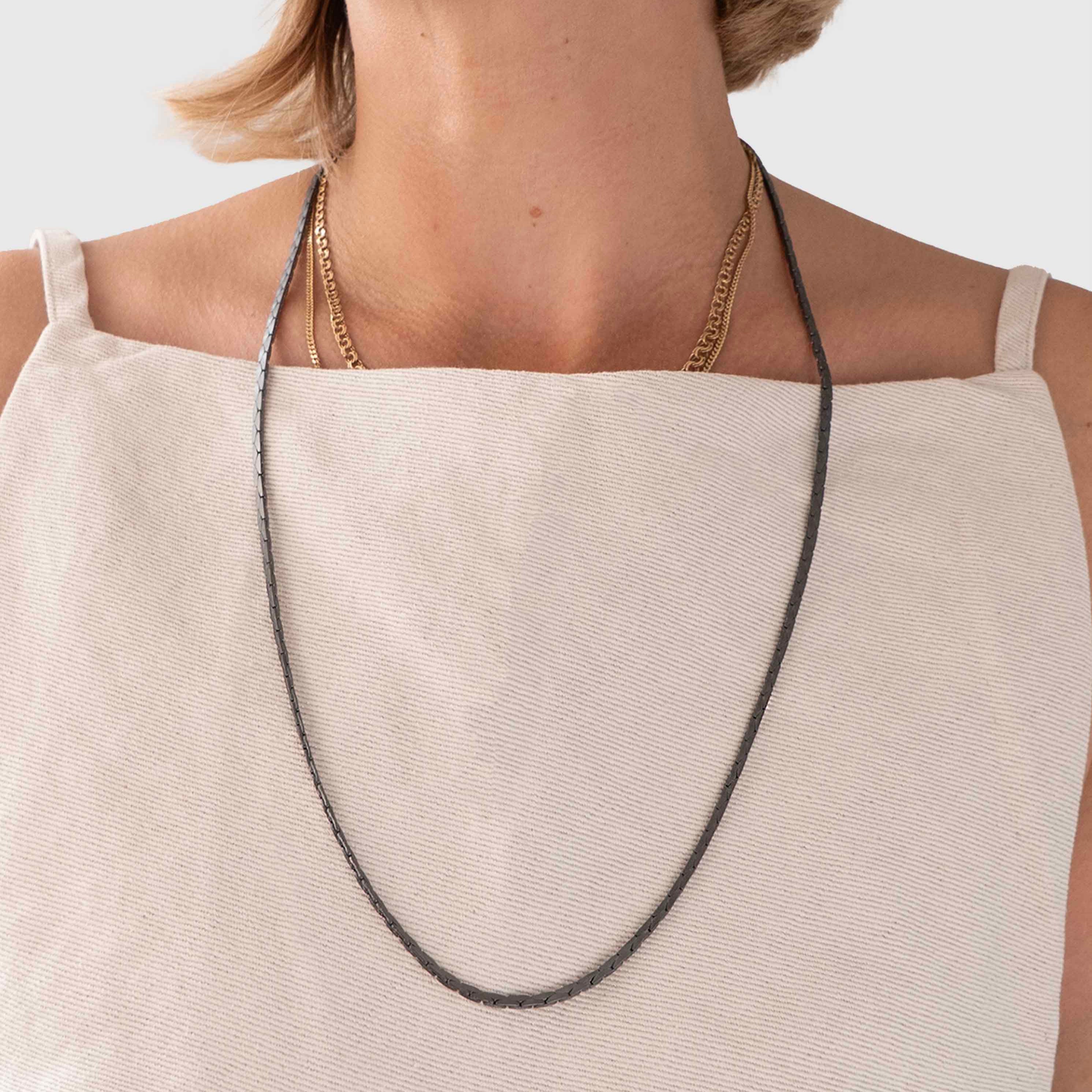 Protect, elevate and keep track of your eyewear with this Hematite Matte Black plated eyewear, eyeglasses and sunglasses chain from Tapper, ensuring elegant and convenient safekeeping around your neck. When not in use as an eyewear chain, detach the silicone holders from the lobster clasps and use it as a necklace, bracelet or pair it with another set of chains as body jewelry / jewellery. Designed in Sweden.