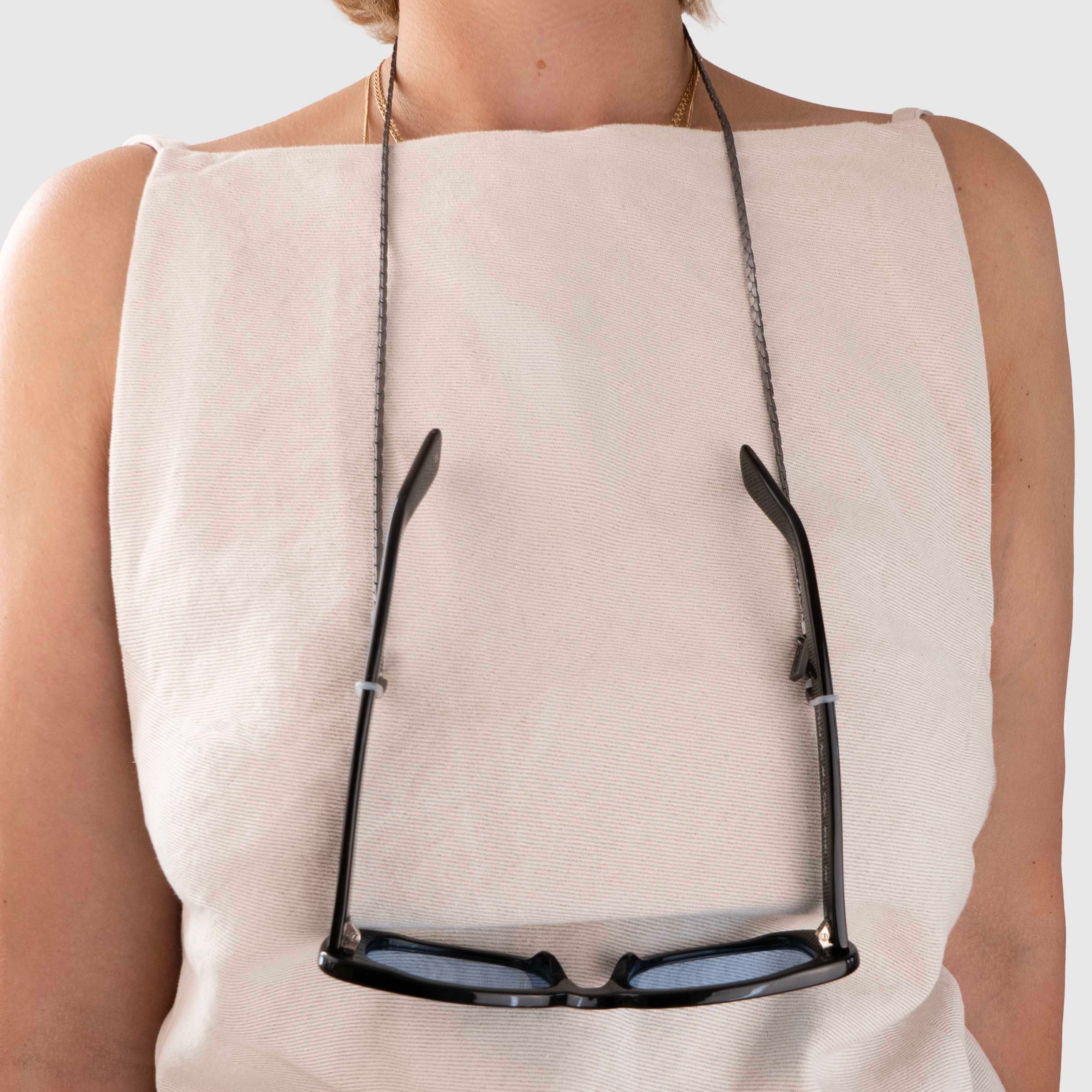 Protect, elevate and keep track of your eyewear with this Hematite Matte Black plated eyewear, eyeglasses and sunglasses chain from Tapper, ensuring elegant and convenient safekeeping around your neck. When not in use as an eyewear chain, detach the silicone holders from the lobster clasps and use it as a necklace, bracelet or pair it with another set of chains as body jewelry / jewellery. Designed in Sweden.