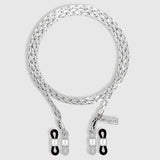 Protect, elevate and keep track of your eyewear with this 925 Silver plated eyewear, eyeglasses and sunglasses chain from Tapper, ensuring elegant and convenient safekeeping around your neck. When not in use as an eyewear chain, detach the silicone holders from the lobster clasps and use it as a necklace, bracelet or pair it with another set of chains as body jewelry / jewellery. Designed in Sweden.