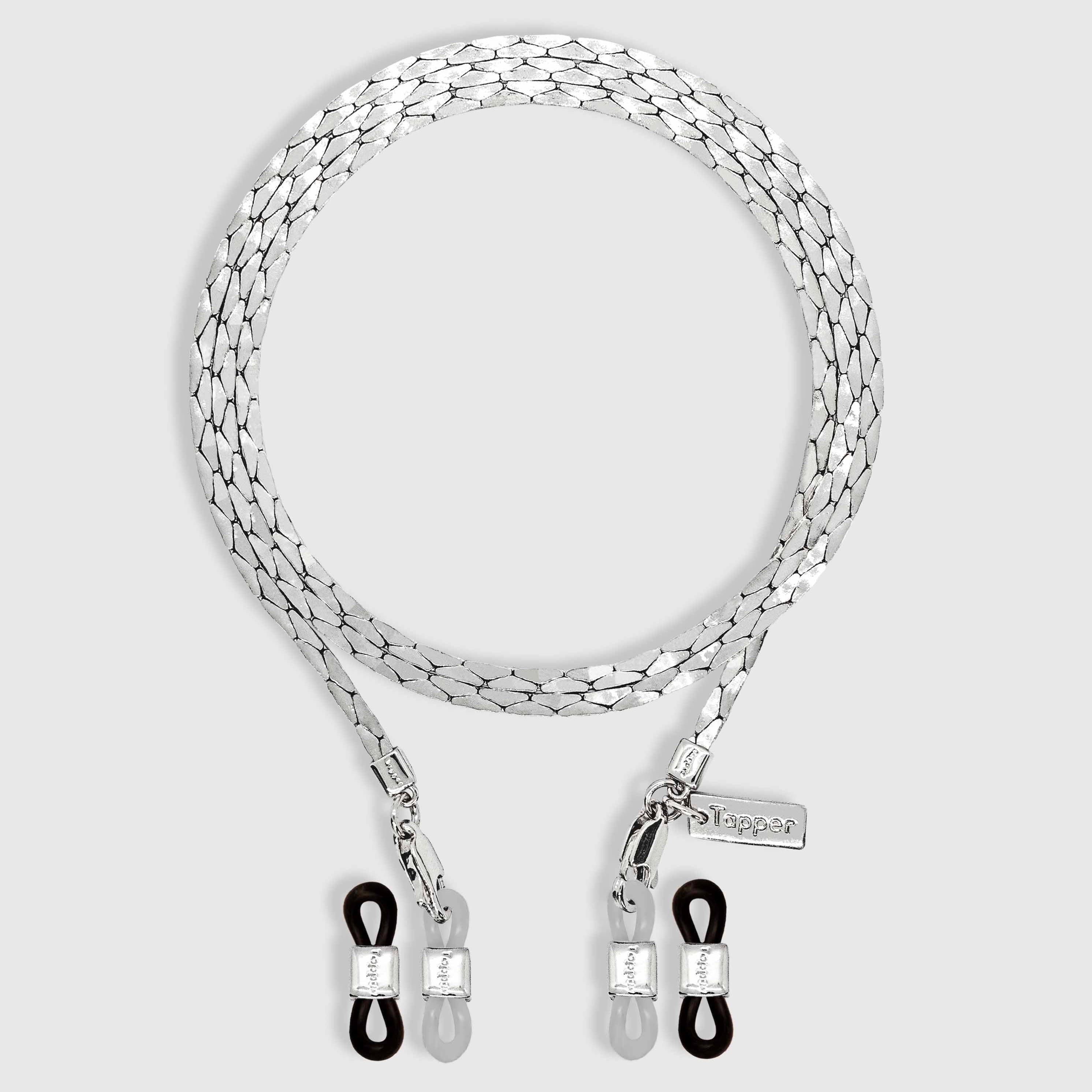 Protect, elevate and keep track of your eyewear with this 925 Silver plated eyewear, eyeglasses and sunglasses chain from Tapper, ensuring elegant and convenient safekeeping around your neck. When not in use as an eyewear chain, detach the silicone holders from the lobster clasps and use it as a necklace, bracelet or pair it with another set of chains as body jewelry / jewellery. Designed in Sweden.