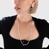 Protect, elevate and keep track of your eyewear with this 925 Silver plated eyewear, eyeglasses and sunglasses chain from Tapper, ensuring elegant and convenient safekeeping around your neck. When not in use as an eyewear chain, detach the silicone holders from the lobster clasps and use it as a necklace, bracelet or pair it with another set of chains as body jewelry / jewellery. Designed in Sweden.