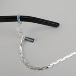 925 Silver Plated Glasses Chain by Tapper – Keep your eyewear secure and stylish with this elegant eyewear accessory. Designed in Sweden, this versatile chain fits eyeglasses and sunglasses, doubling as a necklace, bracelet, or body jewelry.