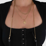 Protect, elevate and keep track of your eyewear with this 18K Gold plated eyewear, eyeglasses and sunglasses chain from Tapper, ensuring elegant and convenient safekeeping around your neck. When not in use as an eyewear chain, detach the silicone holders from the lobster clasps and use it as a necklace, bracelet or pair it with another set of chains as body jewelry / jewellery. Designed in Sweden.
