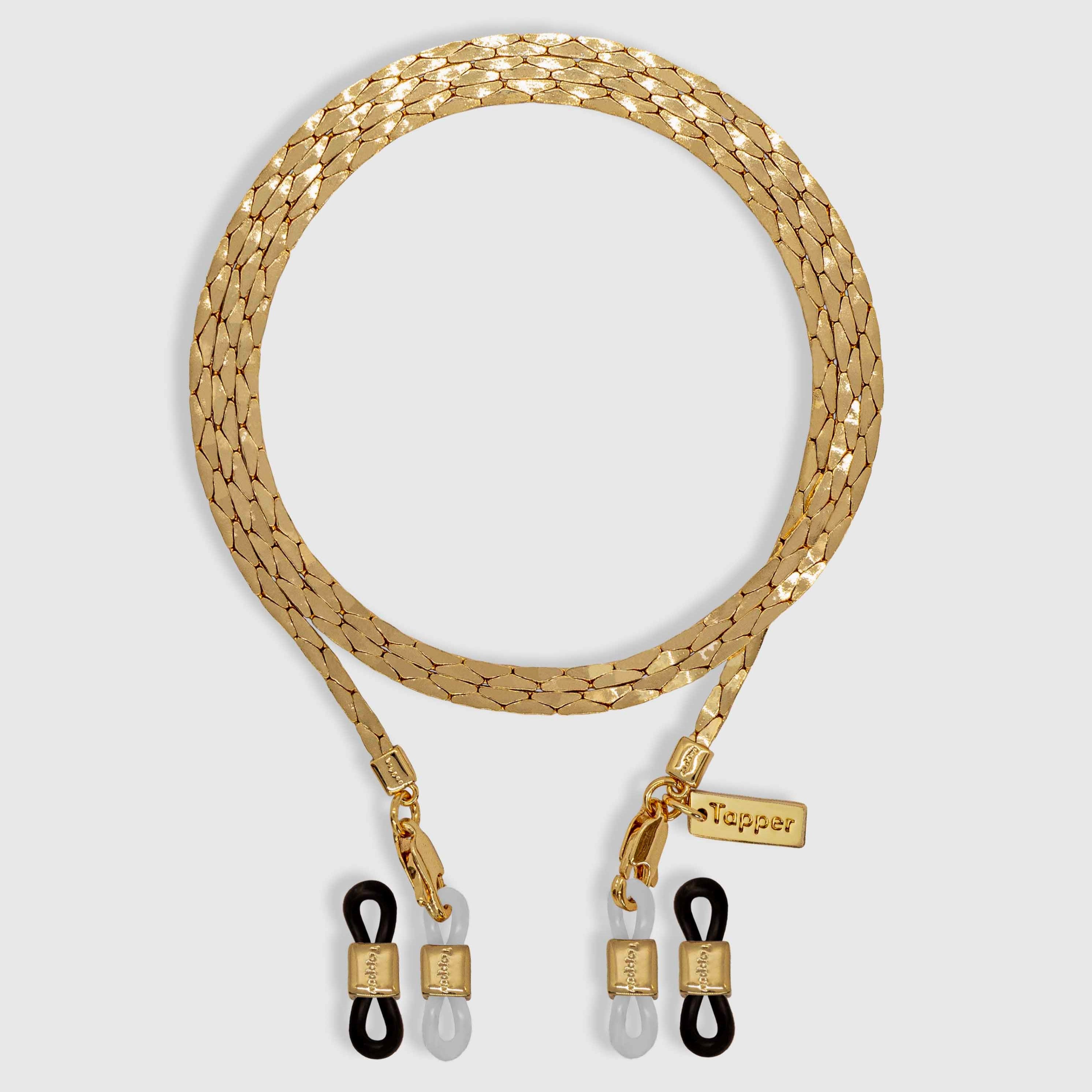Protect, elevate and keep track of your eyewear with this 18K Gold plated eyewear, eyeglasses and sunglasses chain from Tapper, ensuring elegant and convenient safekeeping around your neck. When not in use as an eyewear chain, detach the silicone holders from the lobster clasps and use it as a necklace, bracelet or pair it with another set of chains as body jewelry / jewellery. Designed in Sweden.