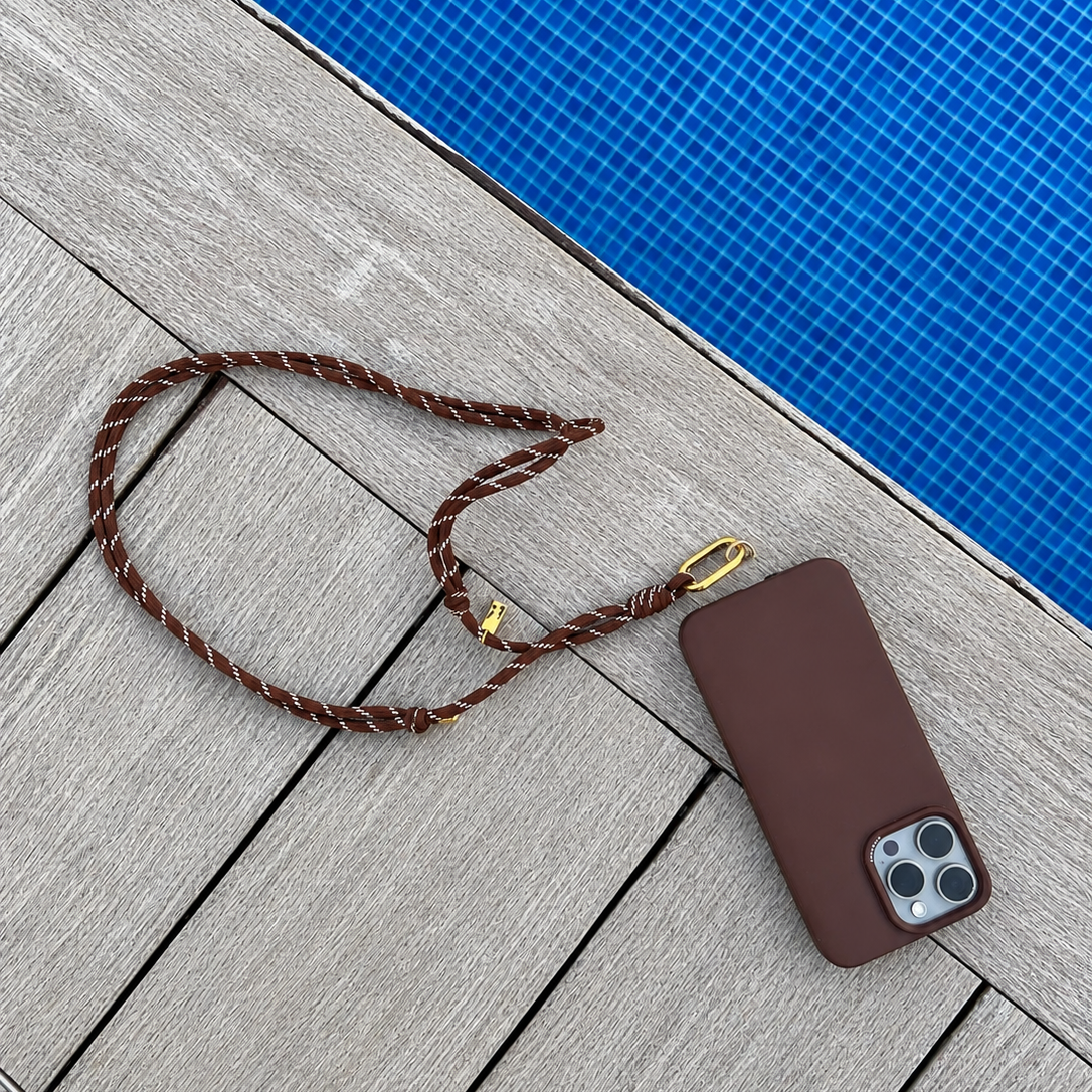 Tapper Adjustable Nylon Crossbody & Neck Phone Strap with 18k gold details—luxury, secure & stylish phone accessory for all phone cases.