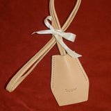 Handmade black leather AirPods strap and leather key holder with keychain and pouch ring, crafted in Sweden