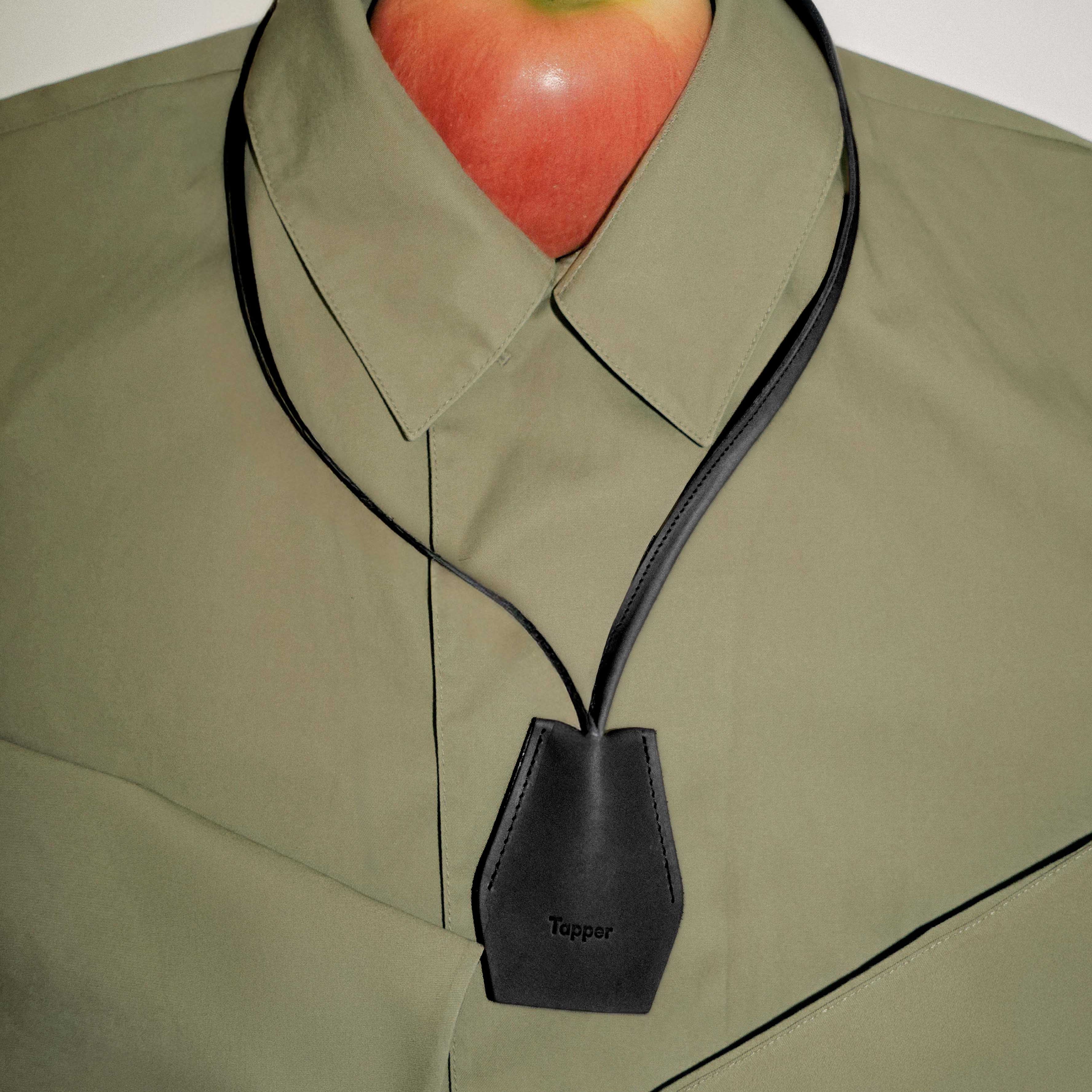 Handmade black leather AirPods strap and leather key holder with keychain and pouch ring, crafted in Sweden