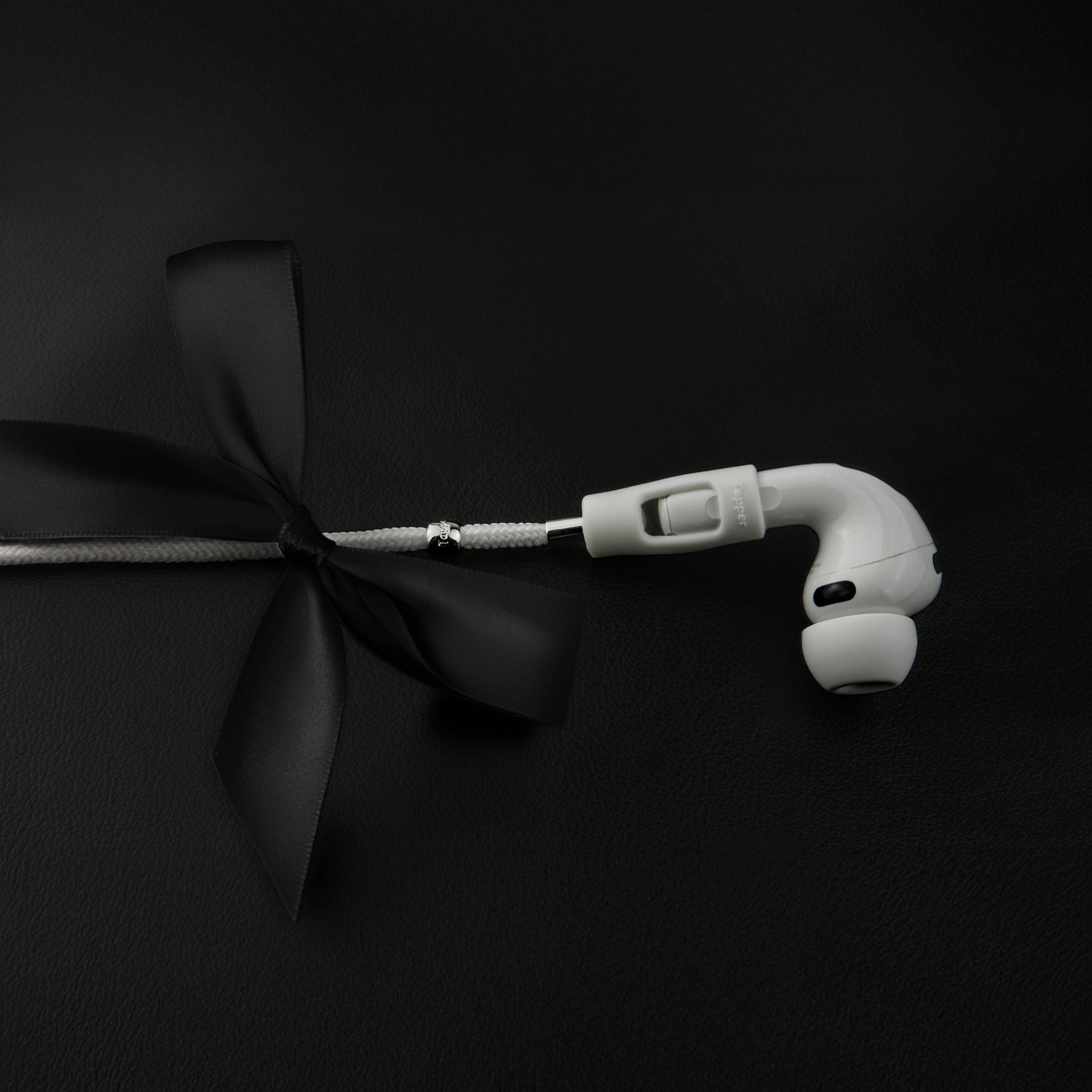Never lose or misplace your AirPods again. Let the lightweight and durable Tapper Nylon AirPods Strap Necklace keep track of your AirPods and AirPods Pro by eliminating the need to hold them in your hands, drop them into your pockets, or risk losing them if they fall out of your ears. Comes with a built-in magnetic lock that snaps the AirPods around your neck, forming a sleek necklace and making them easily accessible. AirPods Strap compatible with Apple AirPods & AirPod Pro (1st, 2nd, 3rd, 4th generation)