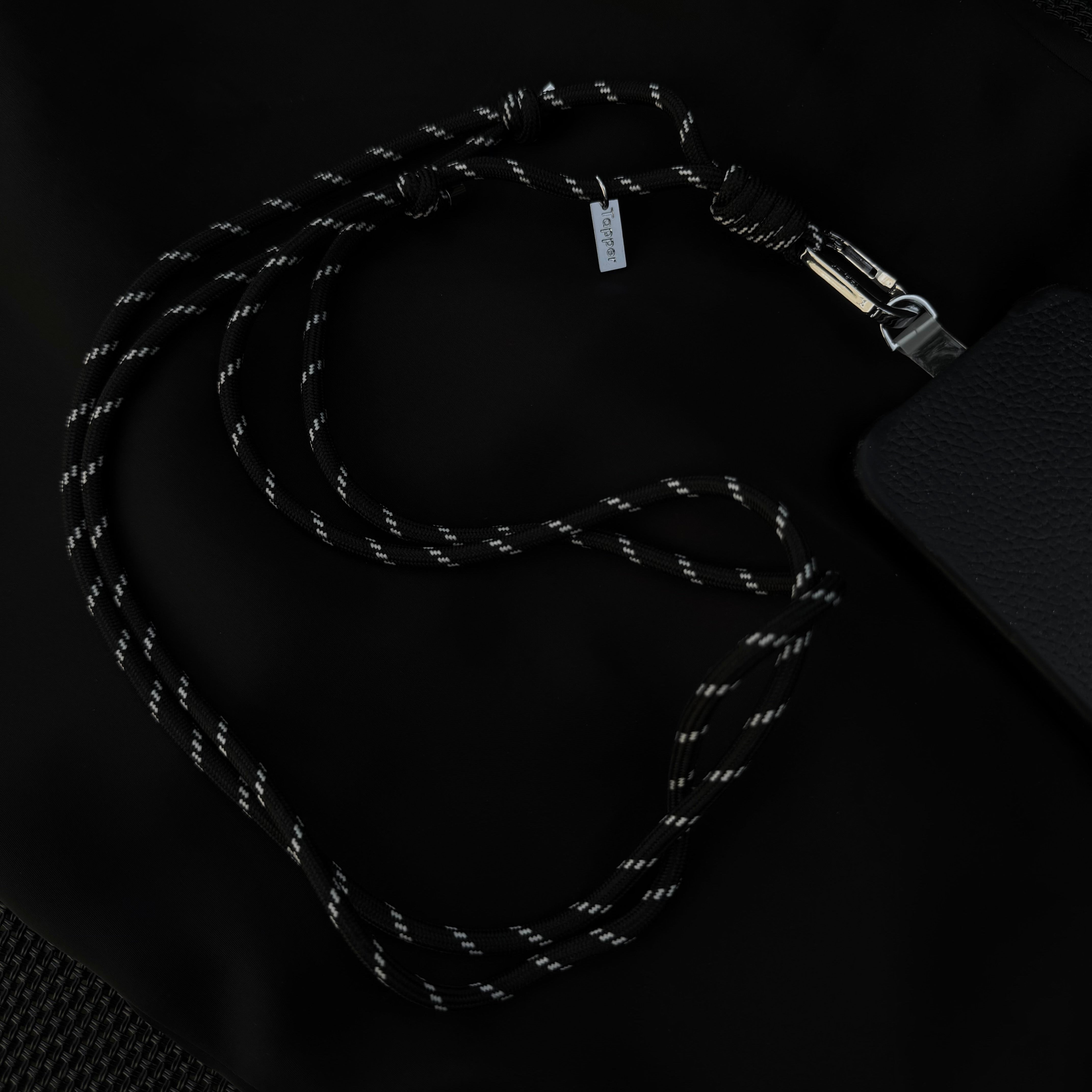 Black and silver crossbody and neck phone strap by Tapper - for all phones. Adjustable strap for that perfect fit. 