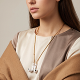 Tapper's real 18K gold plated original tech jewelry foxtail chain protects your AirPods. The luxurious, elevated and accessible necklace plated in precious metals steps up your AirPod jewellery game. Worried about losing your AirPods? Magnetic lock for convenient and hassle-free safekeeping around the neck. The next must-have AirPods accessory crafted for ultimate luxury. Compatible with all generations of Apple AirPods and AirPods Pro. Designed in Sweden by Tapper. Free Express Shipping at gettapper.com
