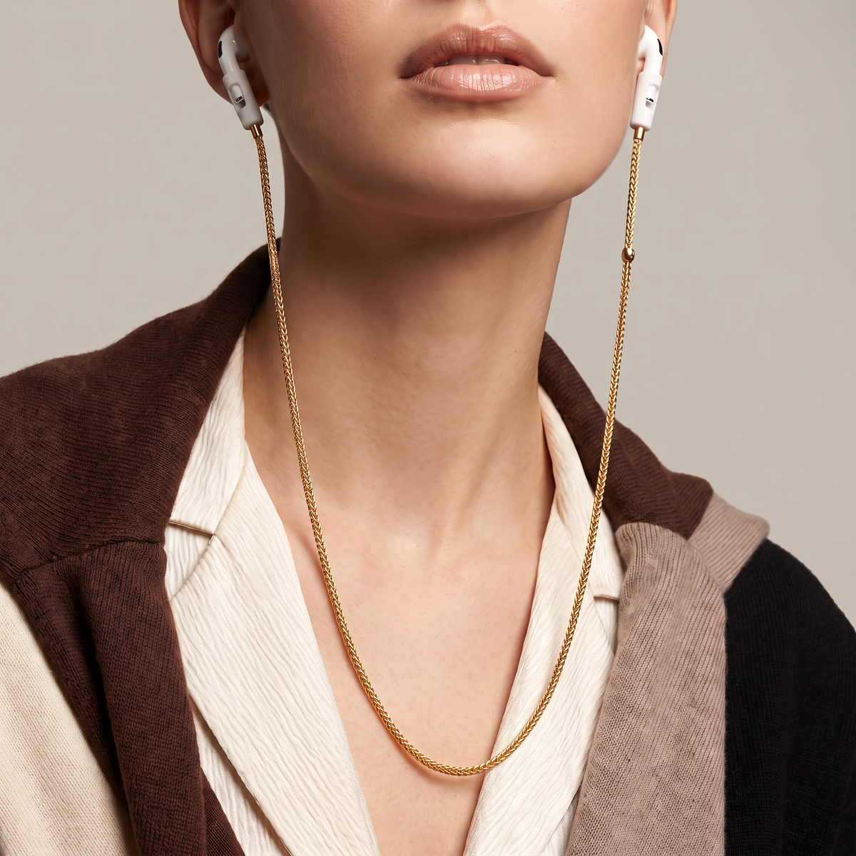 Tapper's real 18K gold plated original tech jewelry mesh chain protects your AirPods. The luxurious, elevated and accessible necklace plated in precious metals steps up your AirPod jewellery game. Worried about losing your AirPods? Magnetic lock for convenient and hassle-free safekeeping around the neck. The next must-have AirPods accessory crafted for ultimate luxury. Compatible with all generations of Apple AirPods and AirPods Pro. Designed in Sweden by Tapper. Free Express Shipping at gettapper.com