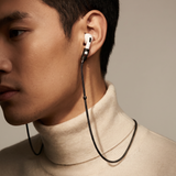Tapper's real hematite black plated original tech jewelry mesh chain protects your AirPods. The luxurious, elevated and accessible necklace plated in precious metals steps up your AirPod jewellery game. Worried about losing your AirPods? Magnetic lock for convenient and hassle-free safekeeping around the neck. The next must-have AirPods accessory crafted for ultimate luxury. Compatible with all generations of Apple AirPods and AirPods Pro. Designed in Sweden by Tapper. Free Express Shipping at gettapper.com