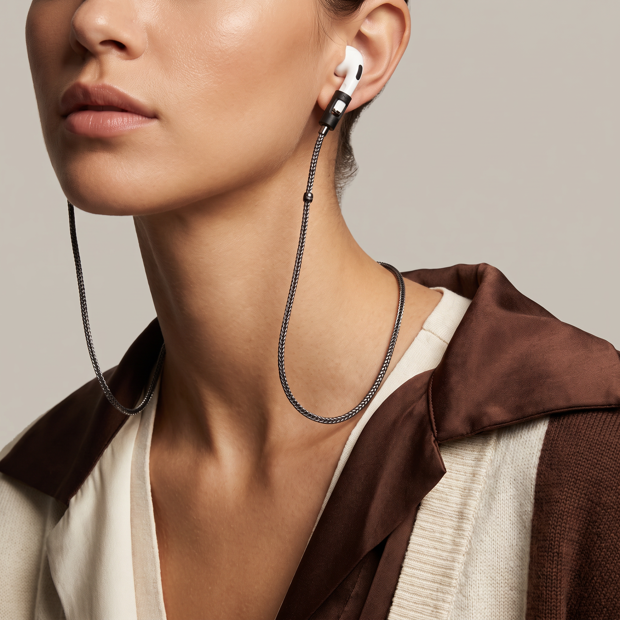 Tapper's real hematite black plated original tech jewelry mesh chain protects your AirPods. The luxurious, elevated and accessible necklace plated in precious metals steps up your AirPod jewellery game. Worried about losing your AirPods? Magnetic lock for convenient and hassle-free safekeeping around the neck. The next must-have AirPods accessory crafted for ultimate luxury. Compatible with all generations of Apple AirPods and AirPods Pro. Designed in Sweden by Tapper. Free Express Shipping at gettapper.com