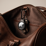 Black Metal Plated AirTag Holder & Case – Luxurious and Secure – A refined metal carabiner case designed to elegantly secure your AirTag to keys, bags, luggage, and more. Crafted by Tapper in Sweden.