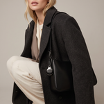 Black Metal Plated AirTag Holder & Case – Luxurious and Secure – A refined metal carabiner case designed to elegantly secure your AirTag to keys, bags, luggage, and more. Crafted by Tapper in Sweden.