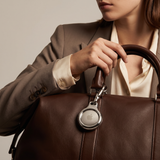 Silver Metal Plated AirTag Holder & Case – Luxurious and Secure – A refined metal carabiner case designed to elegantly secure your AirTag to keys, bags, luggage, and more. Crafted by Tapper in Sweden.