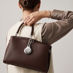 Silver Metal Plated AirTag Holder & Case – Luxurious and Secure – A refined metal carabiner case designed to elegantly secure your AirTag to keys, bags, luggage, and more. Crafted by Tapper in Sweden.