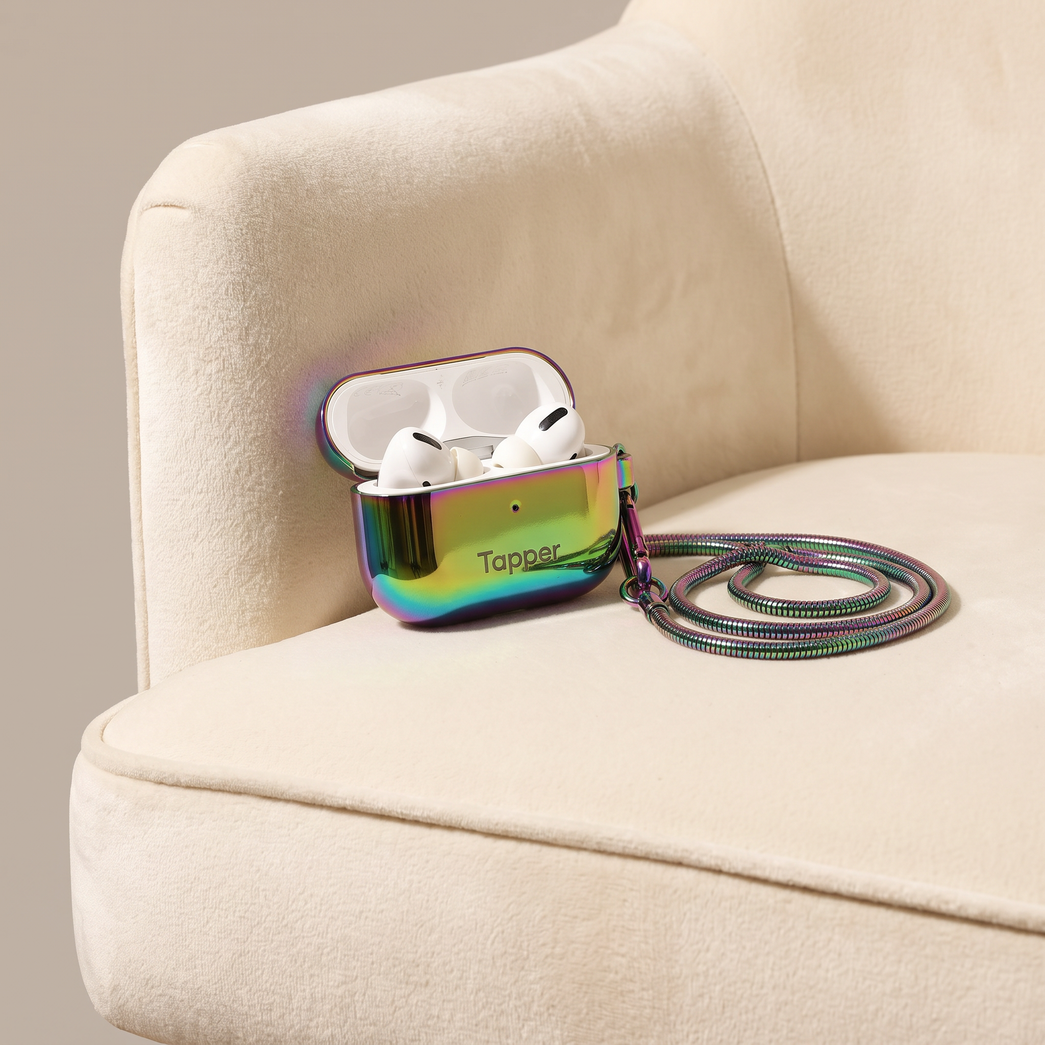 Tapper's Oil Gradient plated original metal neck case jewelry protects your Apple AirPods Pro. Luxurious, elevated & accessible AirPods Pro jewellery plated in precious metals. Worried about losing your AirPods Pro? Detachable snake chain and carabiner for convenient and hassle-free safekeeping around your neck. The next must-have AirPods Pro accessory crafted for ultimate luxury. Compatible with AirPods Pro. Designed in Sweden by Tapper. Free Express Shipping at gettapper.com