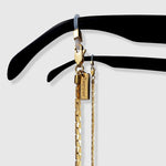 Protect, elevate and keep track of your eyewear with this 18K Gold plated eyewear, eyeglasses and sunglasses chain from Tapper, ensuring elegant and convenient safekeeping around your neck. When not in use as an eyewear chain, detach the silicone holders from the lobster clasps and use it as a necklace, bracelet or pair it with another set of chains as body jewelry / jewellery. Designed in Sweden.