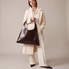 Minimalist leather tote bag handmade in Sweden, premium handbag designed for modern work and travel needs.