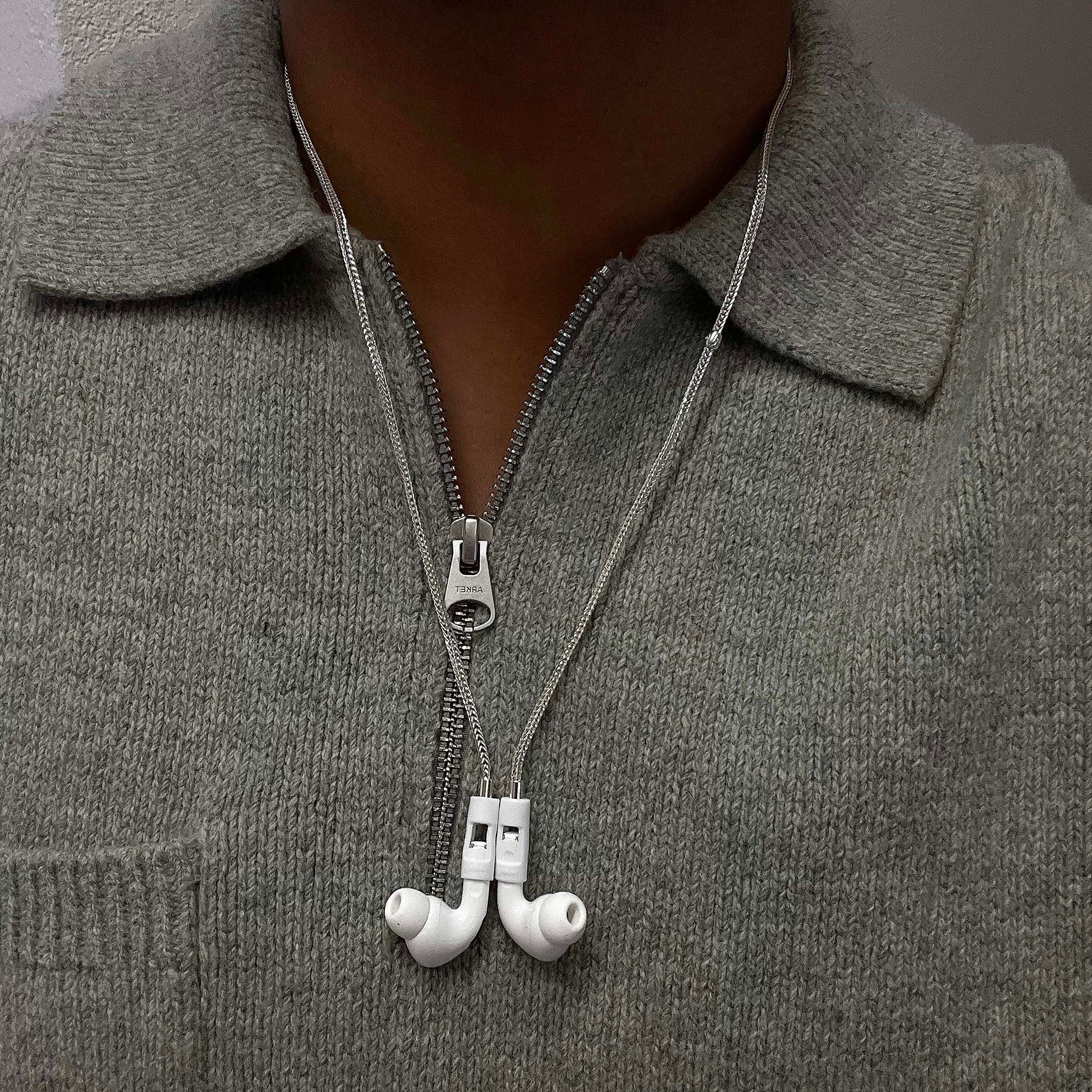 Tapper's real 925 silver plated original tech jewelry mesh chain protects your AirPods. The luxurious, elevated and accessible necklace plated in precious metals steps up your AirPod jewellery game. Worried about losing your AirPods? Magnetic lock for convenient and hassle-free safekeeping around the neck. The next must-have AirPods accessory crafted for ultimate luxury. Compatible with all generations of Apple AirPods and AirPods Pro. Designed in Sweden by Tapper. Free Express Shipping at gettapper.com