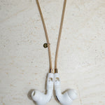 Tapper's solid 18K gold original mesh chain jewelry necklace protects your Apple AirPods & AirPods Pro. Handcrafted in real 18K gold, the exclusive, elevated & accessible mesh chain jewellery snaps the AirPods around your neck. Lost your AirPods? Magnetic lock for convenient and hassle-free safekeeping around your neck. The next must-have & luxe AirPods accessory crafted for ultimate luxury. Compatible with AirPods & AirPods Pro. Designed and handcrafted in Sweden by Tapper. Free Shipping at gettapper.com